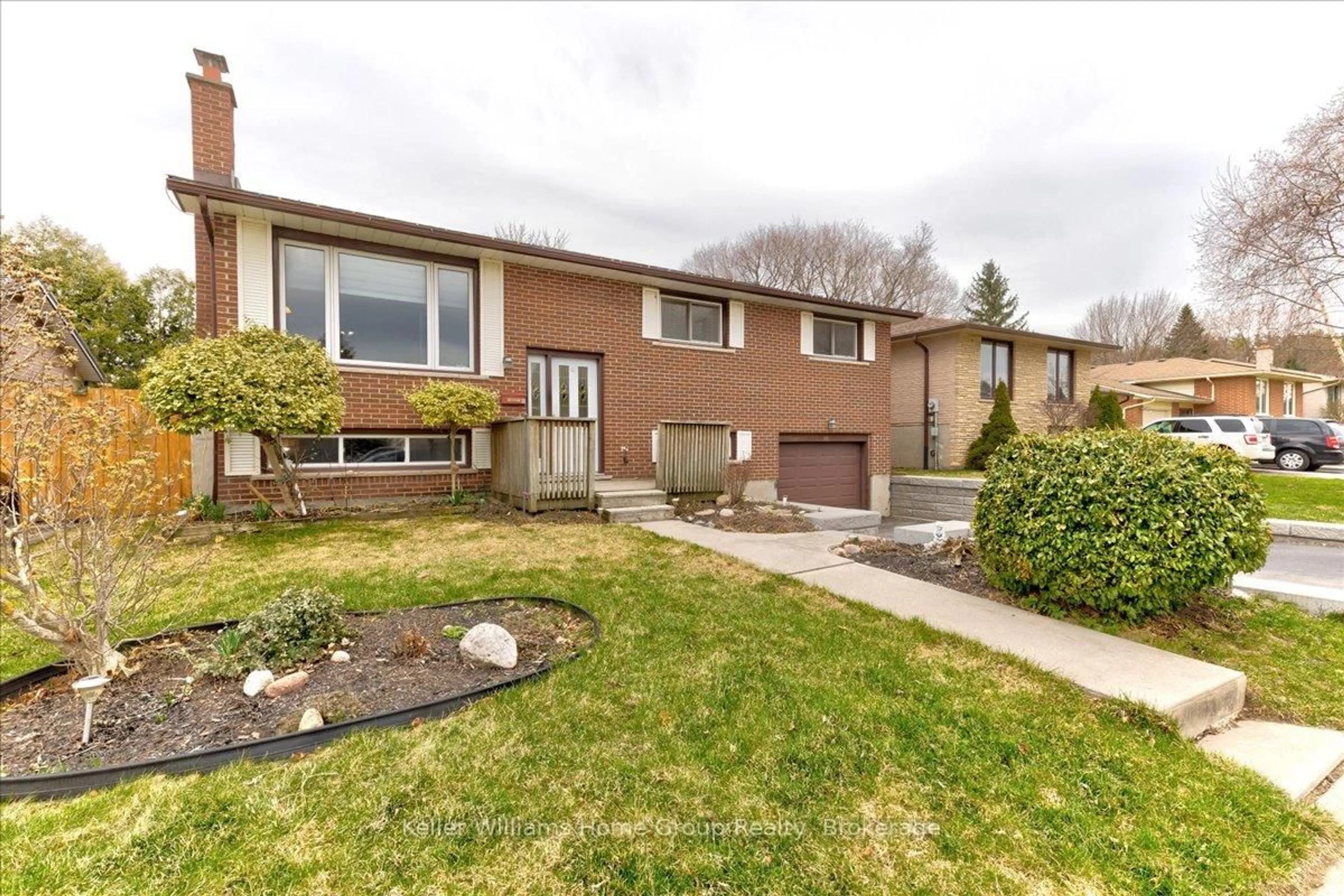 Home with brick exterior material, street for 18 Matthew Dr, Guelph Ontario N1H 7L7
