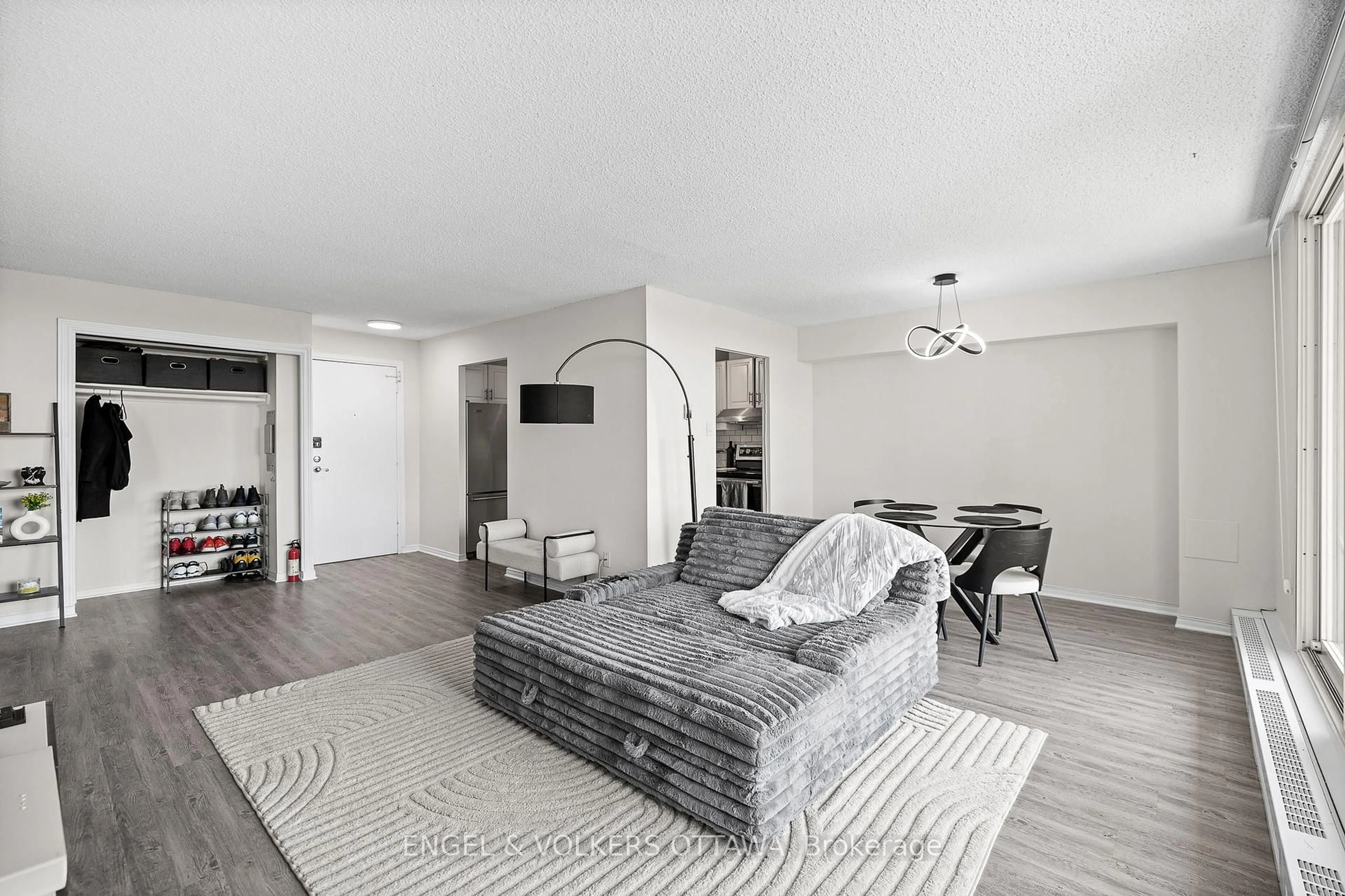 Living room with furniture, unknown for 665 Bathgate Dr #1404, Ottawa Ontario K1K 3Y4