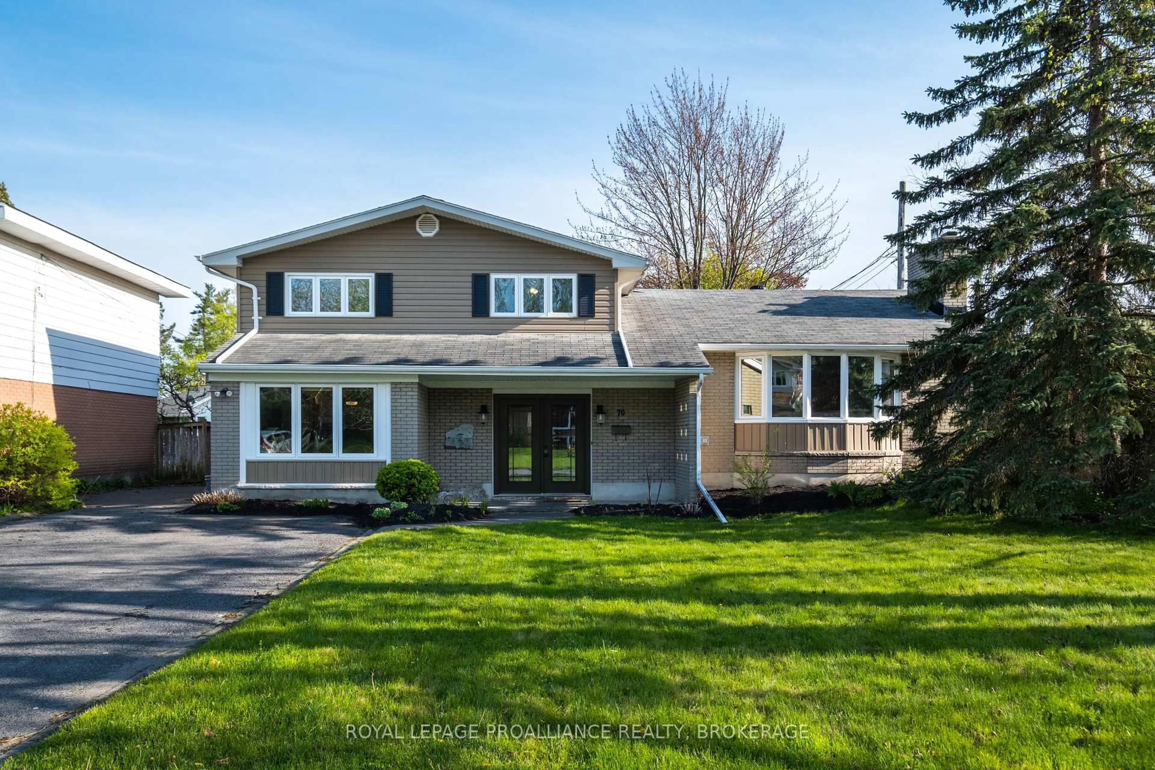 Home with vinyl exterior material, street for 70 Silver St, Kingston Ontario K7M 2P5