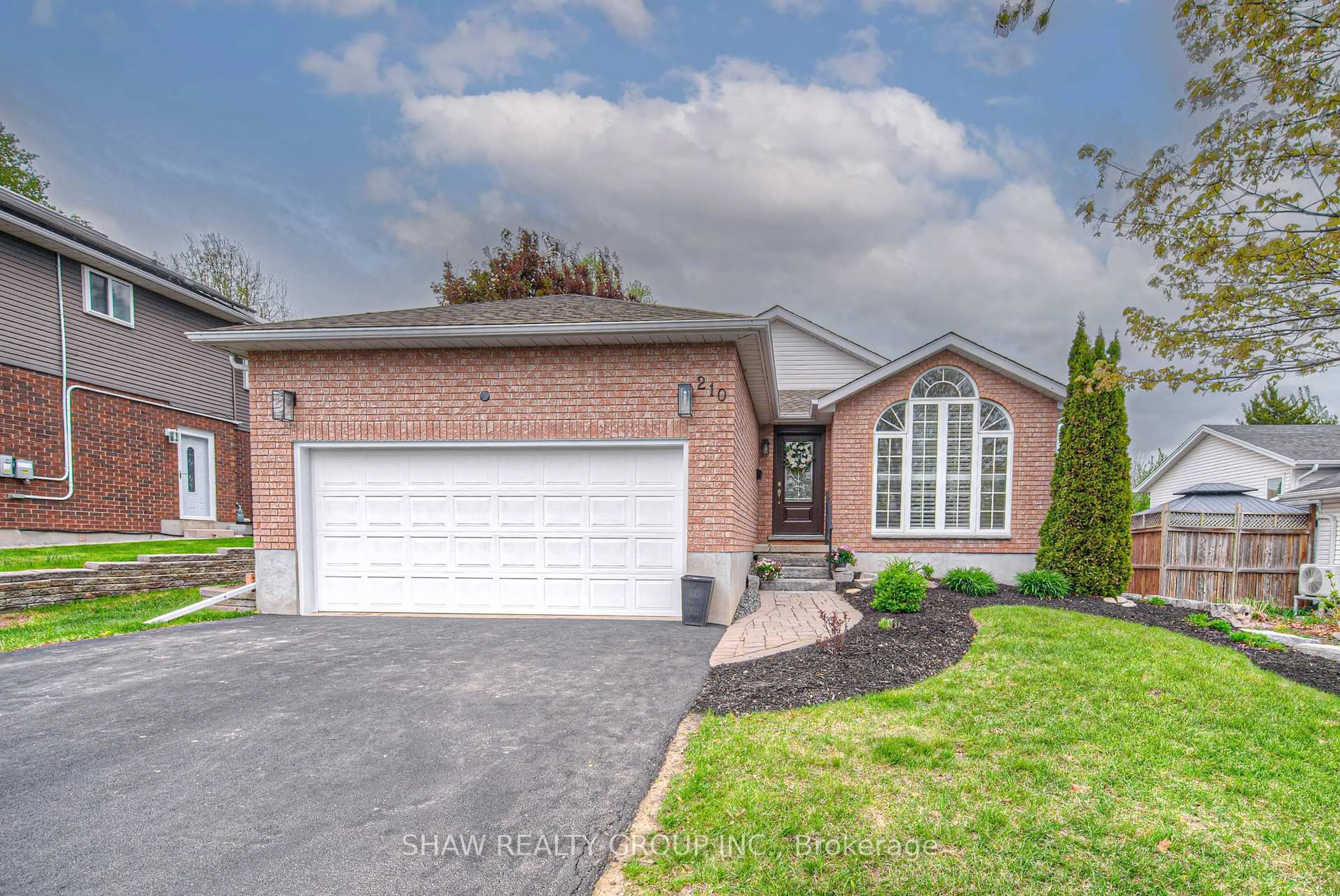 Home with brick exterior material, street for 210 Misty Crt, Kitchener Ontario N2B 3V4