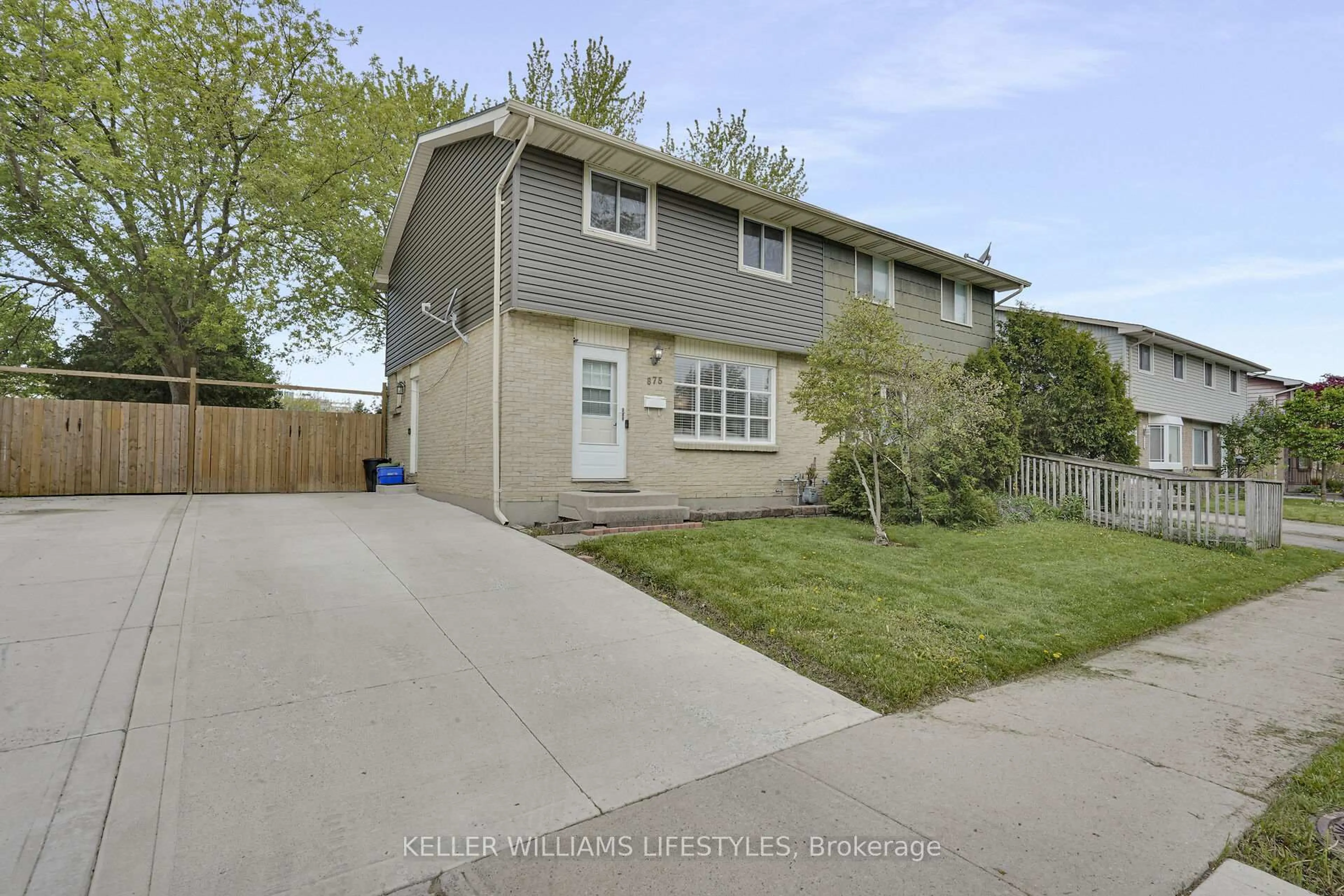 Home with vinyl exterior material, street for 875 Dearness Dr, London South Ontario N6E 1Y4