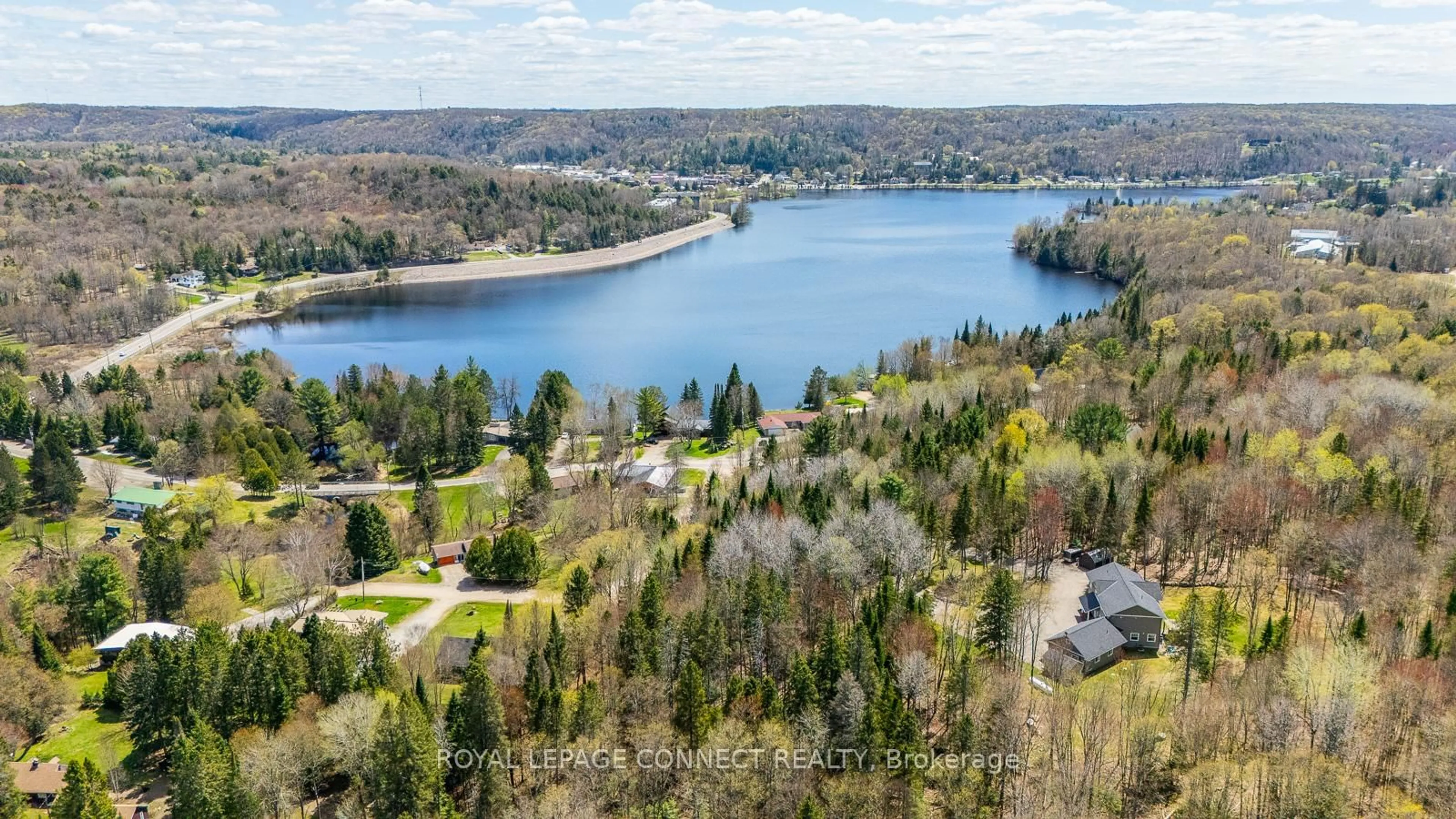 A pic from outside/outdoor area/front of a property/back of a property/a pic from drone, water/lake/river/ocean view for 63 Bayshore Rd, Dysart et al Ontario K0M 1S0