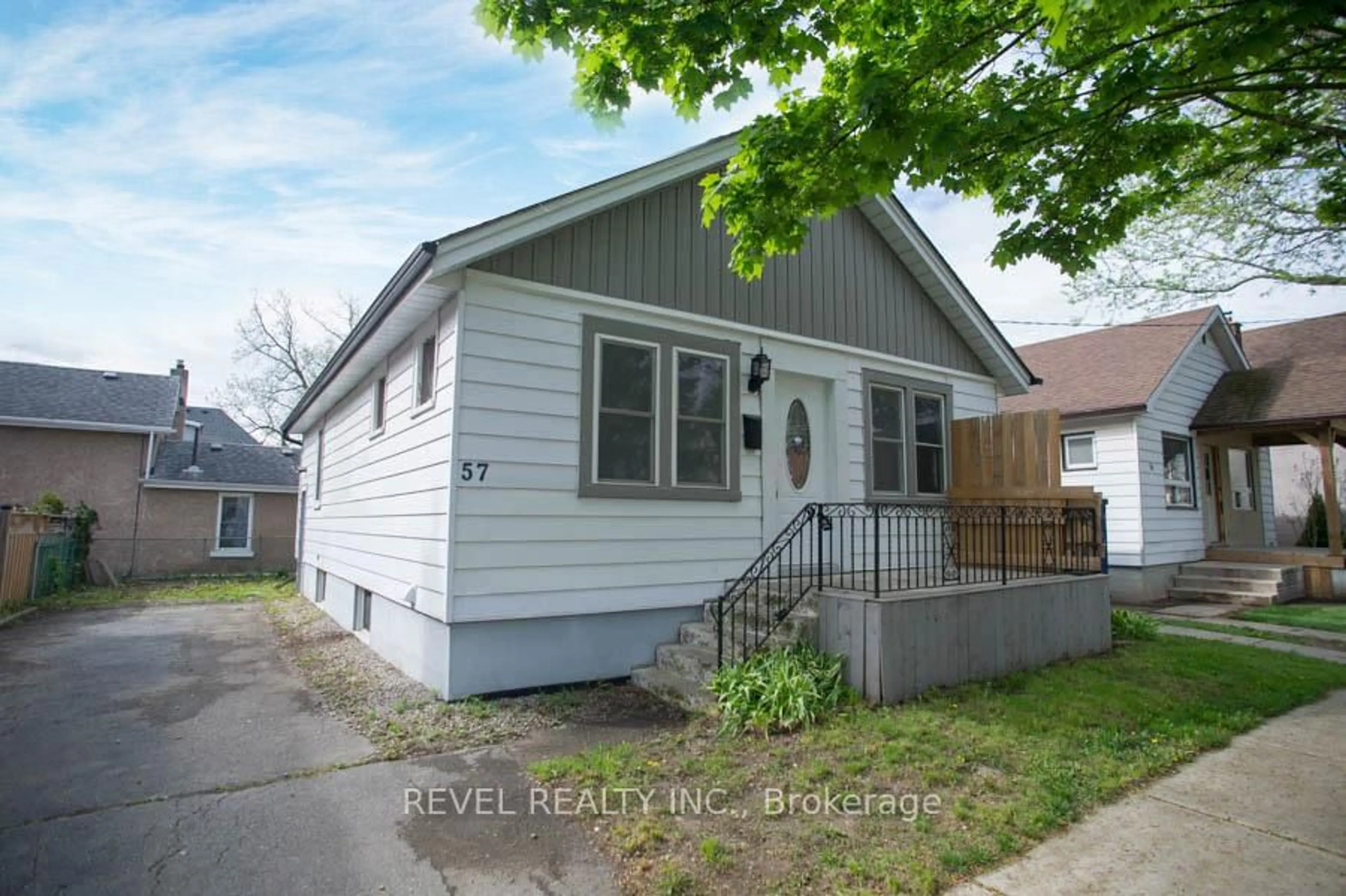 Home with vinyl exterior material, street for 57 Eagle Ave, Brantford Ontario N3S 1Z2