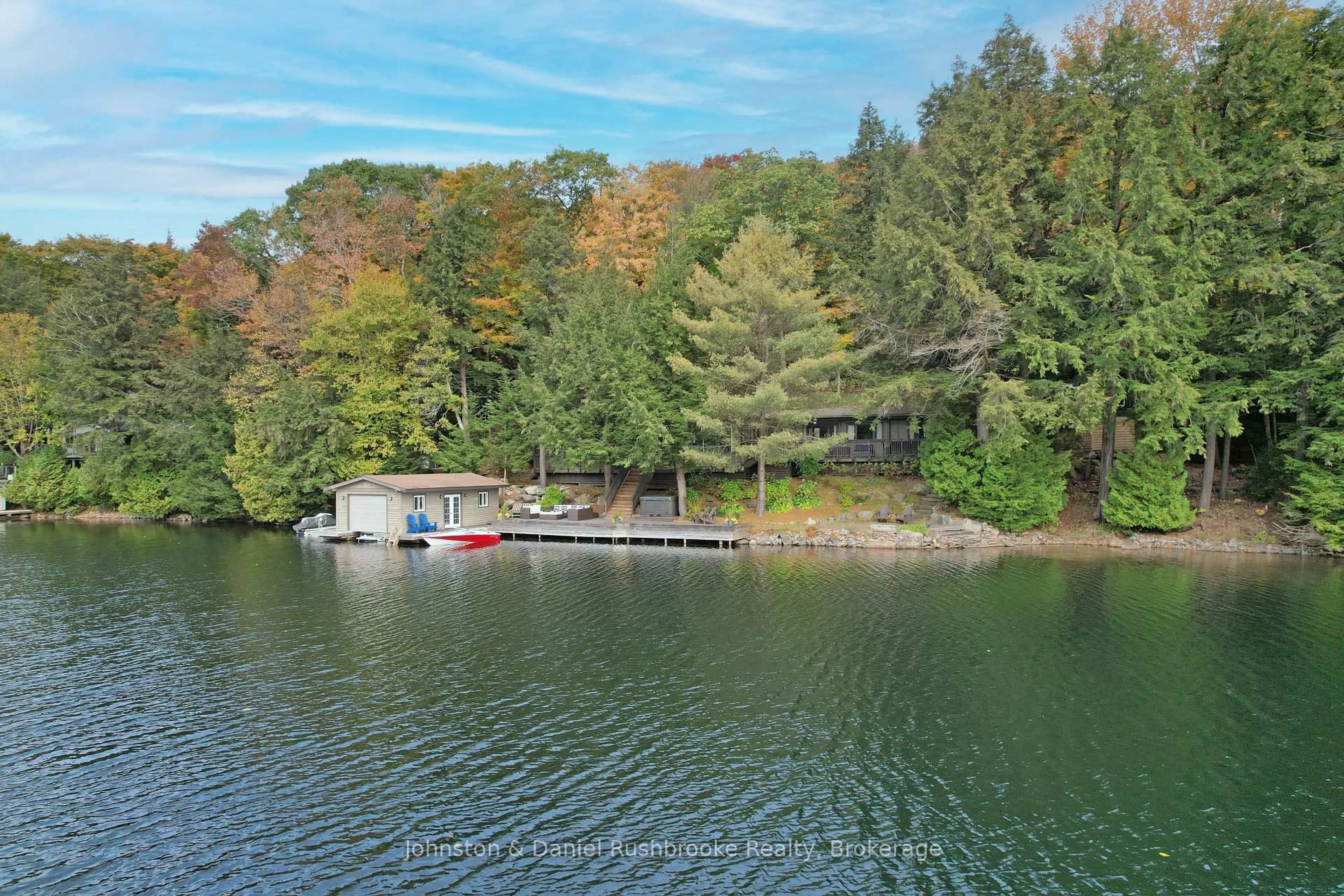 A pic from outside/outdoor area/front of a property/back of a property/a pic from drone, water/lake/river/ocean view for 1030 Murphy Rd, Muskoka Lakes Ontario P0C 1H0