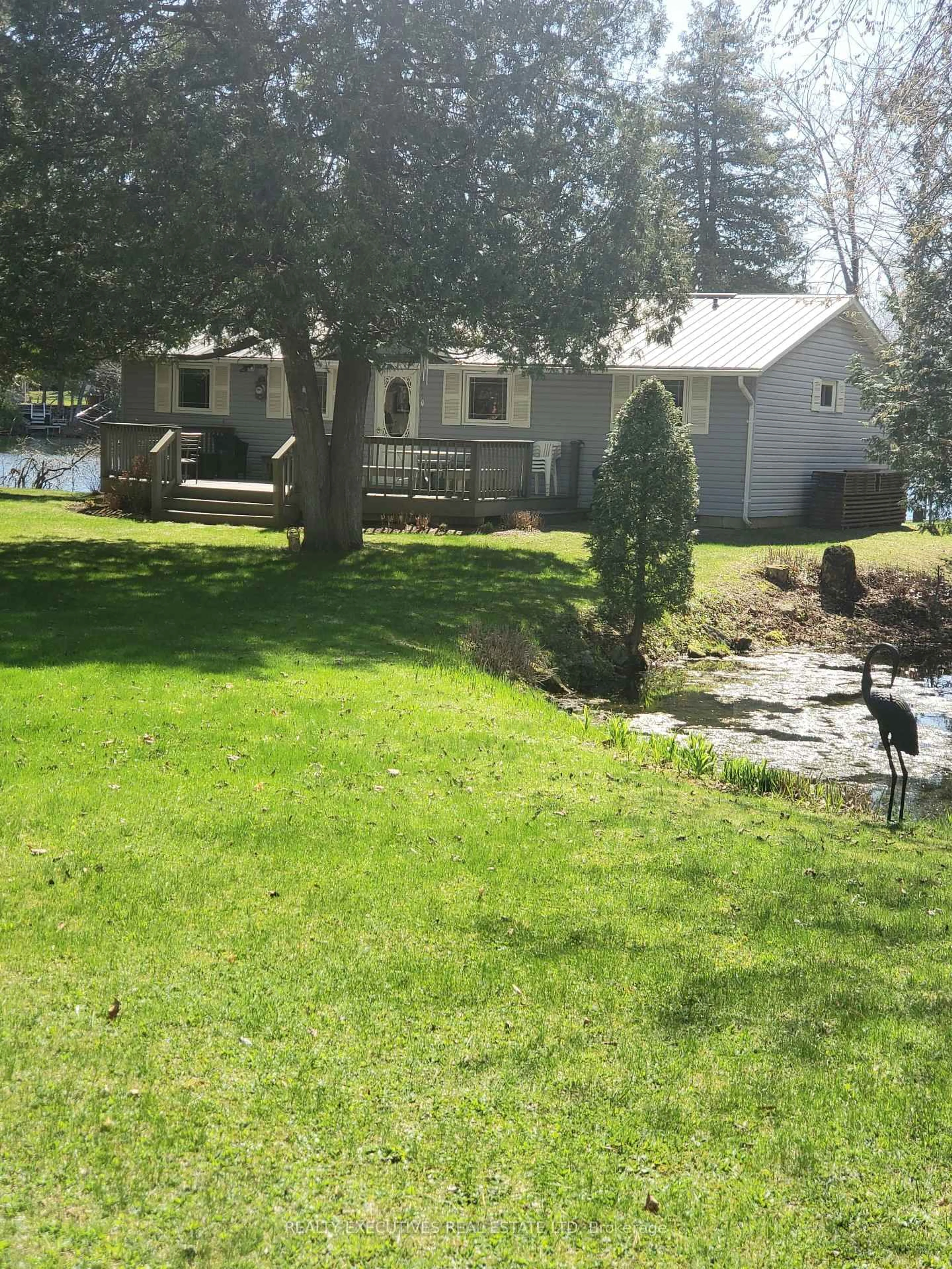 A pic from outside/outdoor area/front of a property/back of a property/a pic from drone, water/lake/river/ocean view for 7 B1 Rd, Rideau Lakes Ontario K0G 1L0