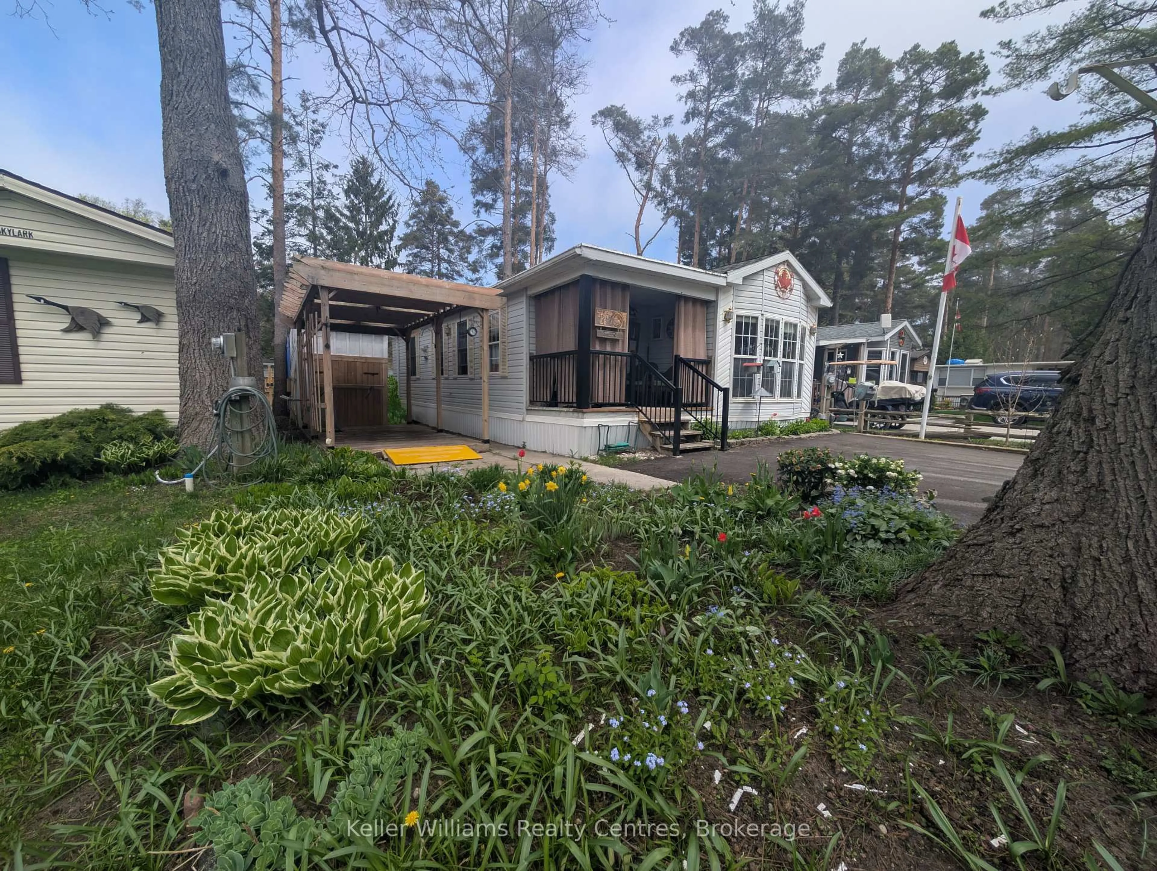 A pic from outside/outdoor area/front of a property/back of a property/a pic from drone, street for 77794 Orchard Line #E8, Central Huron Ontario N0M 1G0