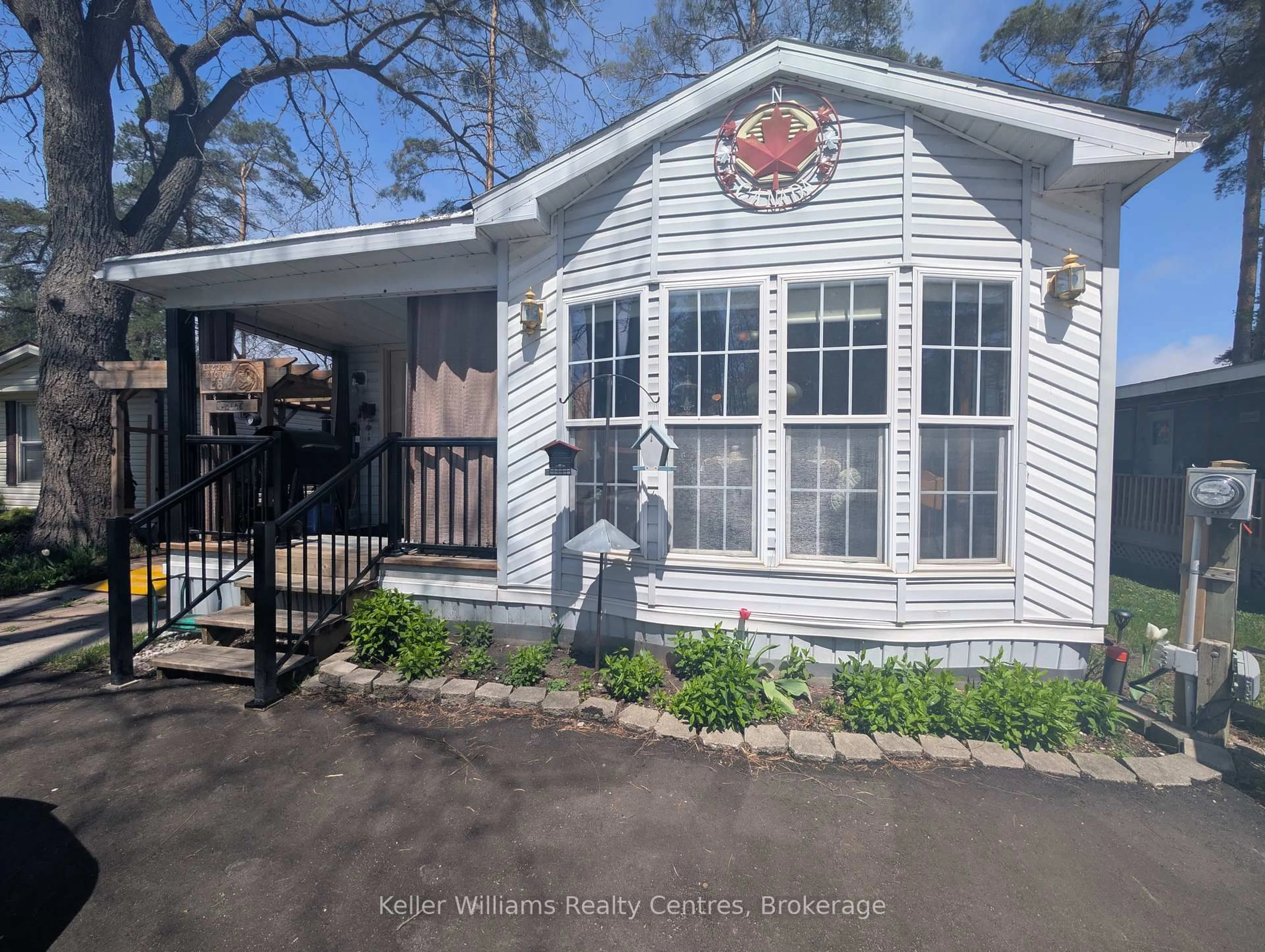 Home with vinyl exterior material, street for 77794 Orchard Line #E8, Central Huron Ontario N0M 1G0