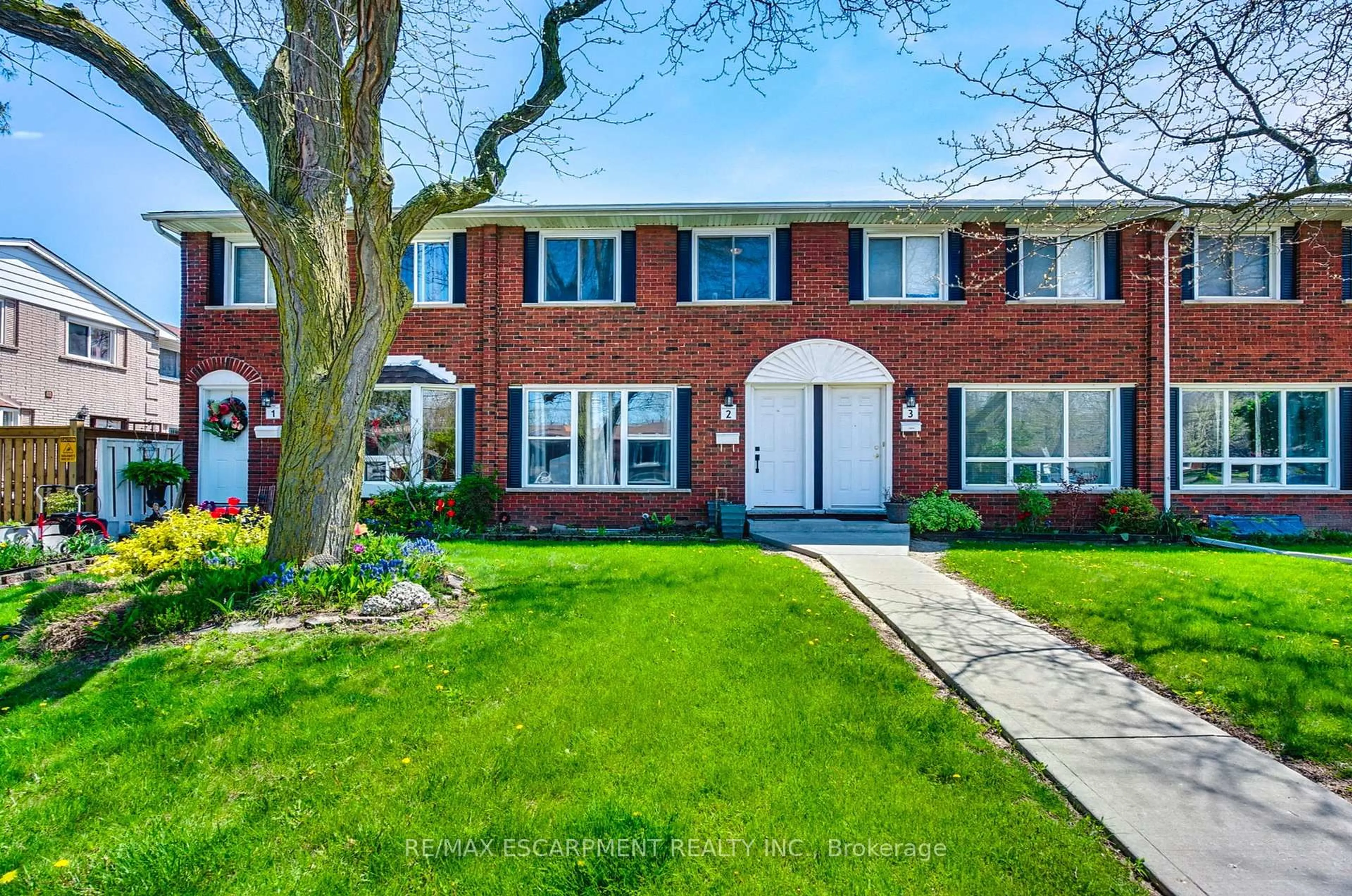 Home with brick exterior material, street for 2700 Barton St #2, Hamilton Ontario L8E 2J7