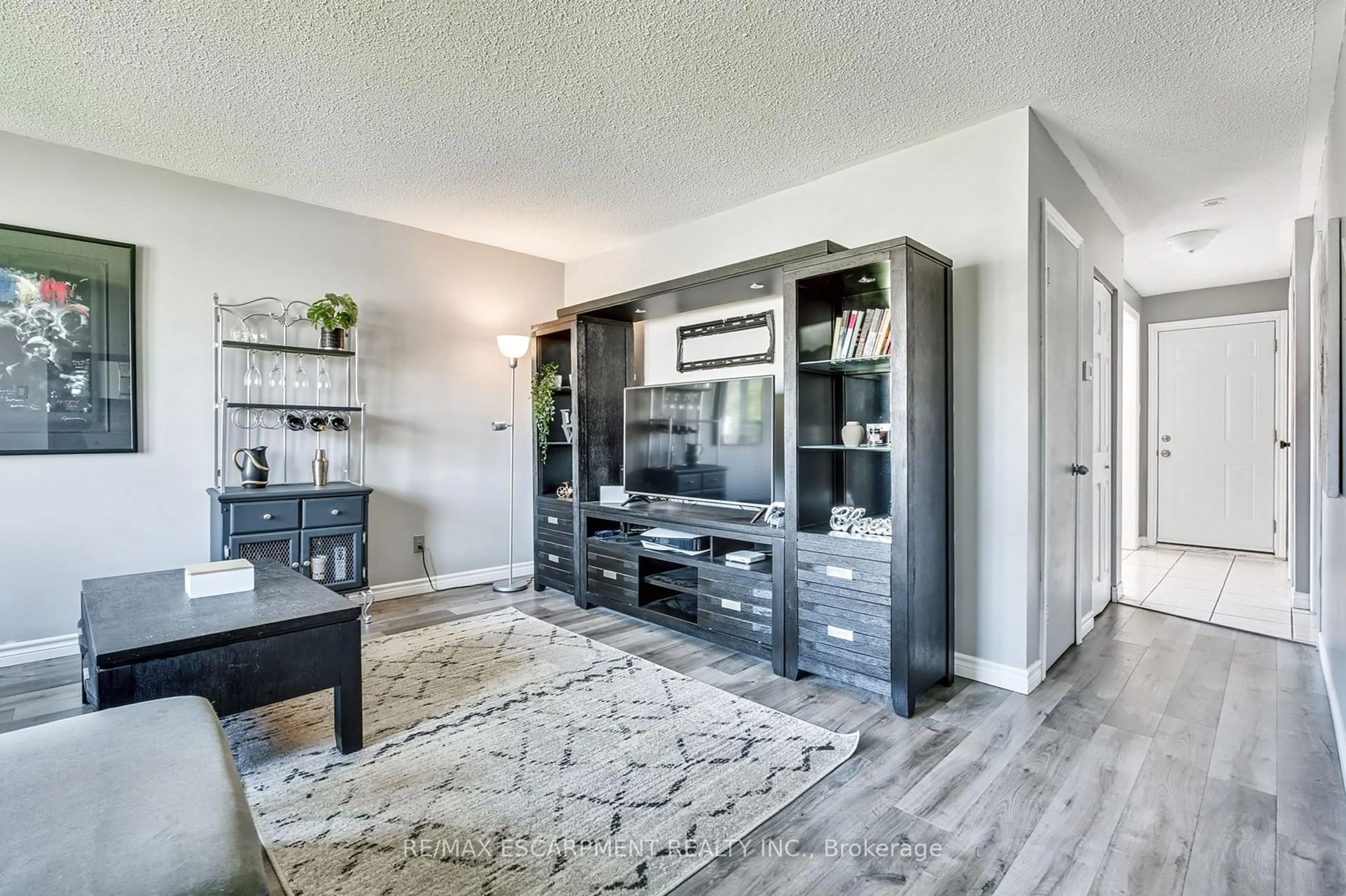 Living room with furniture, unknown for 2700 Barton St #2, Hamilton Ontario L8E 2J7