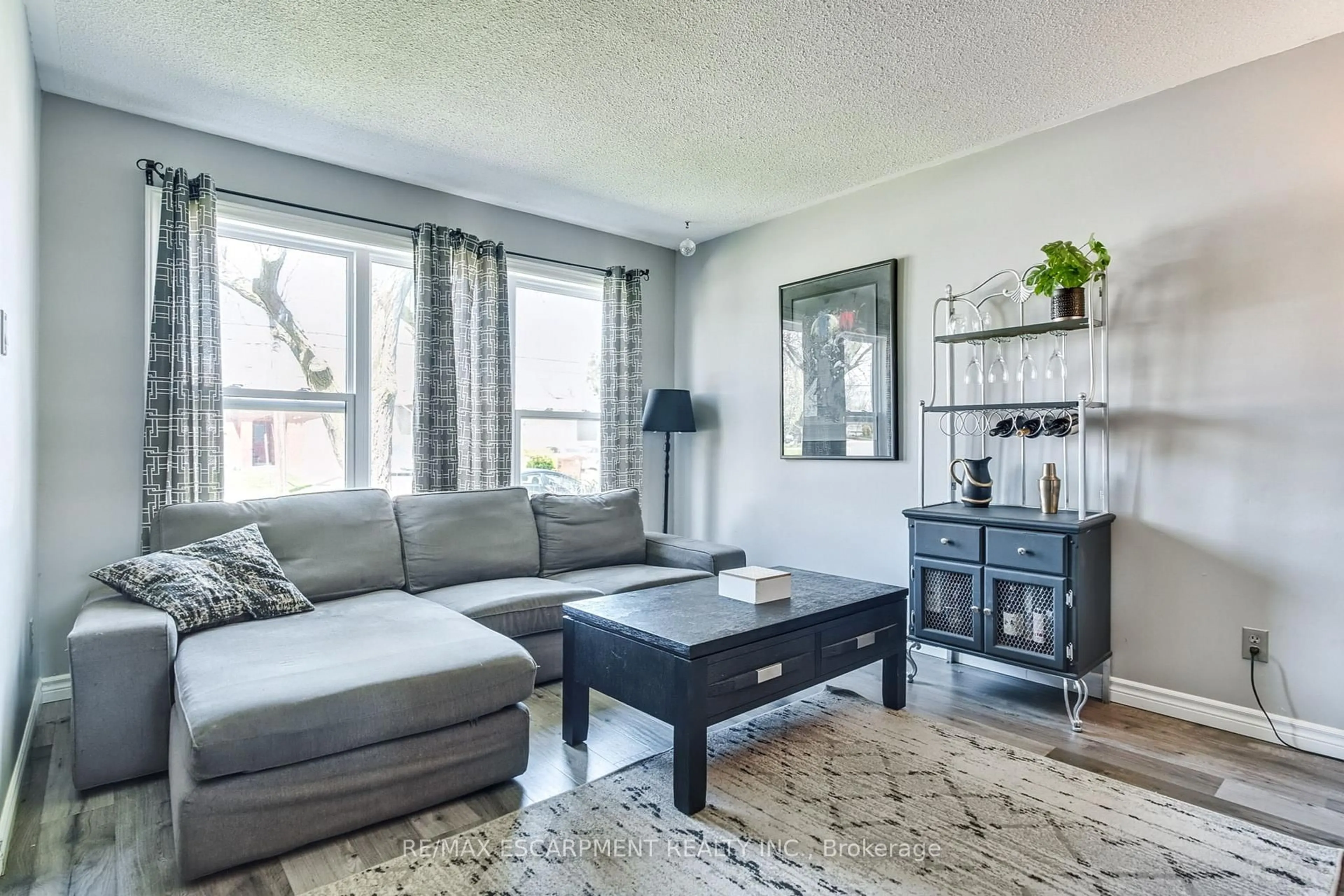 Living room with furniture, unknown for 2700 Barton St #2, Hamilton Ontario L8E 2J7