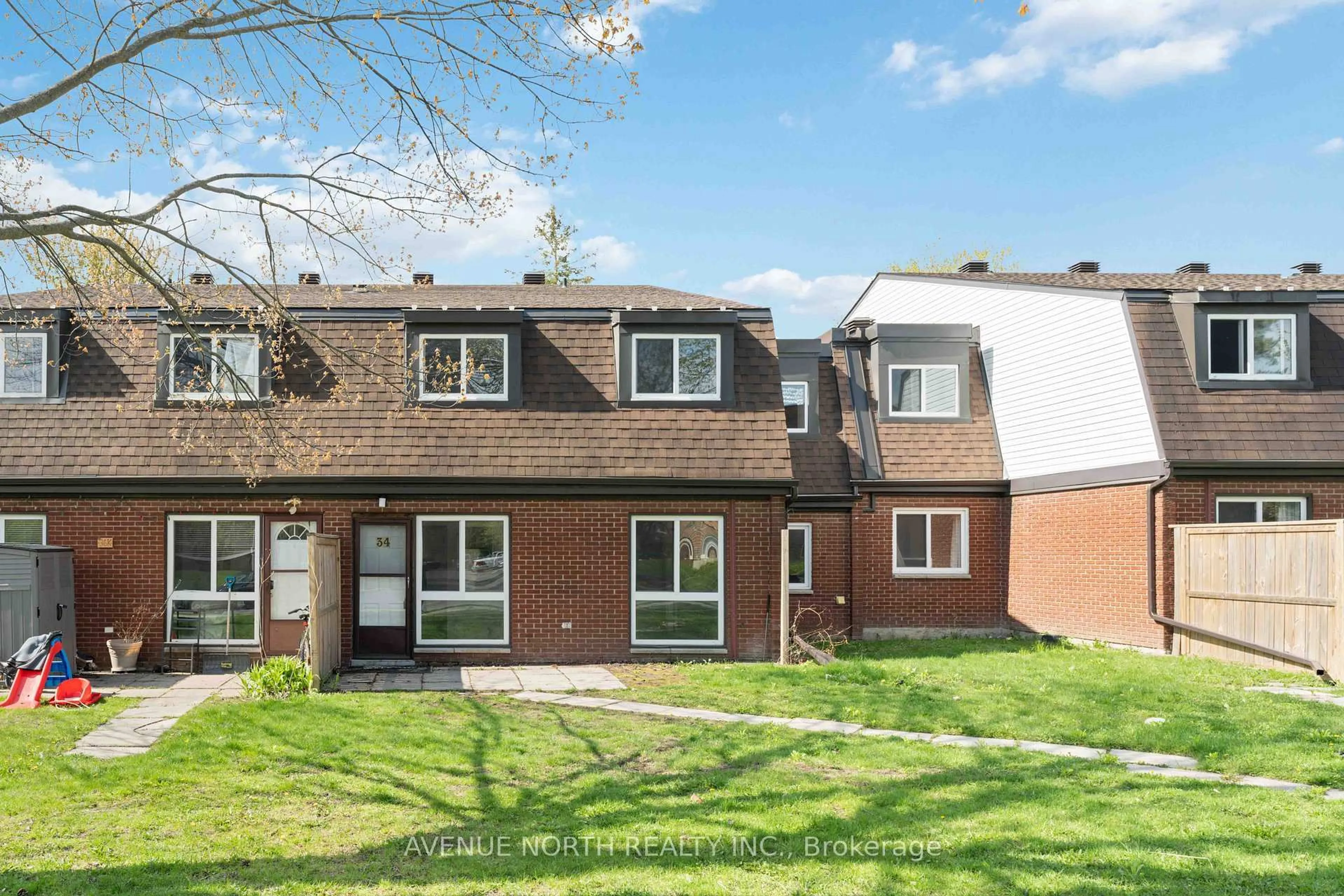 A pic from outside/outdoor area/front of a property/back of a property/a pic from drone, street for 1958 Jasmine Cres #34J, Ottawa Ontario K1J 7W1
