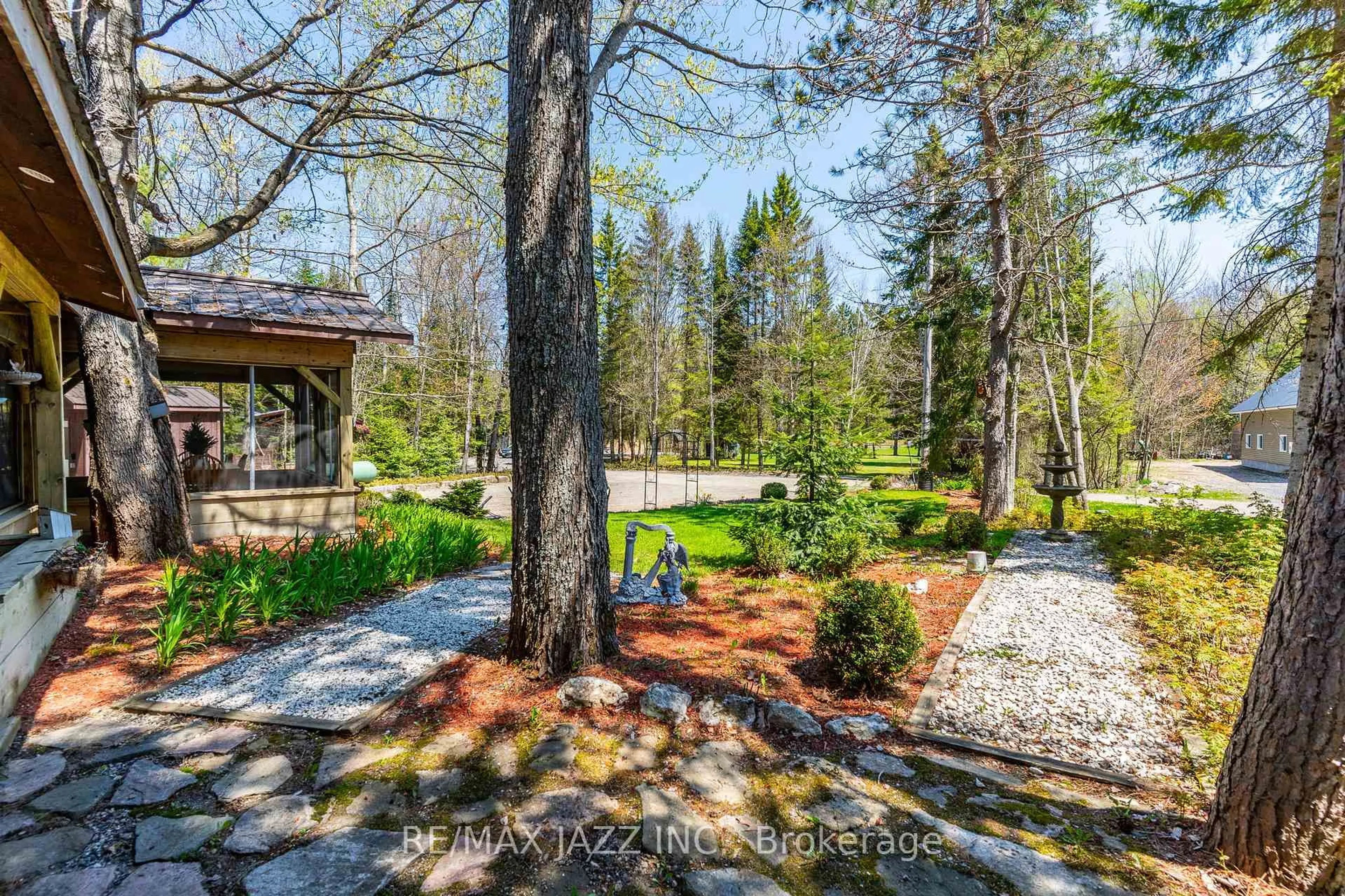 A pic from outside/outdoor area/front of a property/back of a property/a pic from drone, forest/trees view for 1092 Briscoe Dr, Algonquin Highlands Ontario K0M 1J1