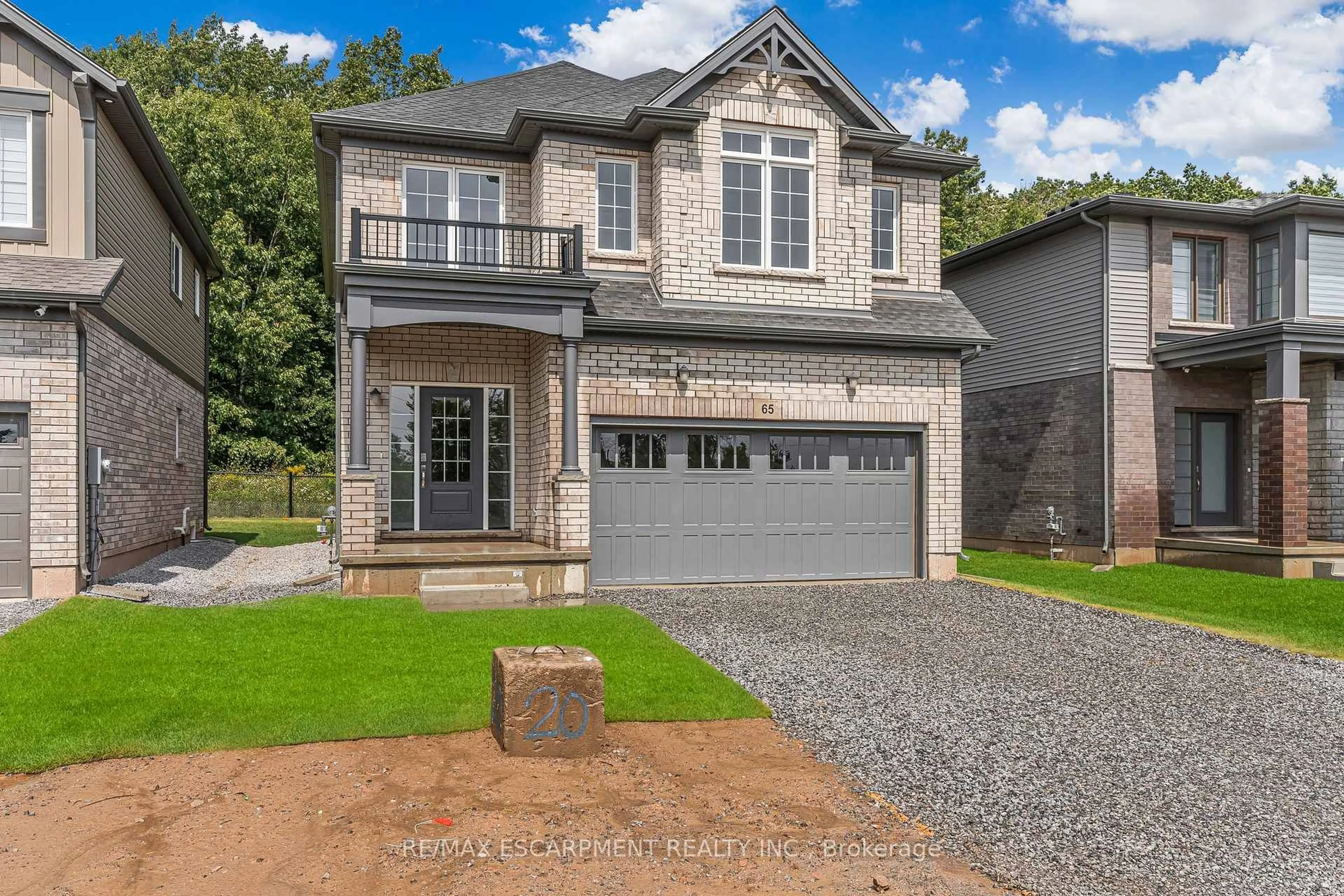 Home with brick exterior material, street for 65 Willson Dr, Thorold Ontario L2V 0G7
