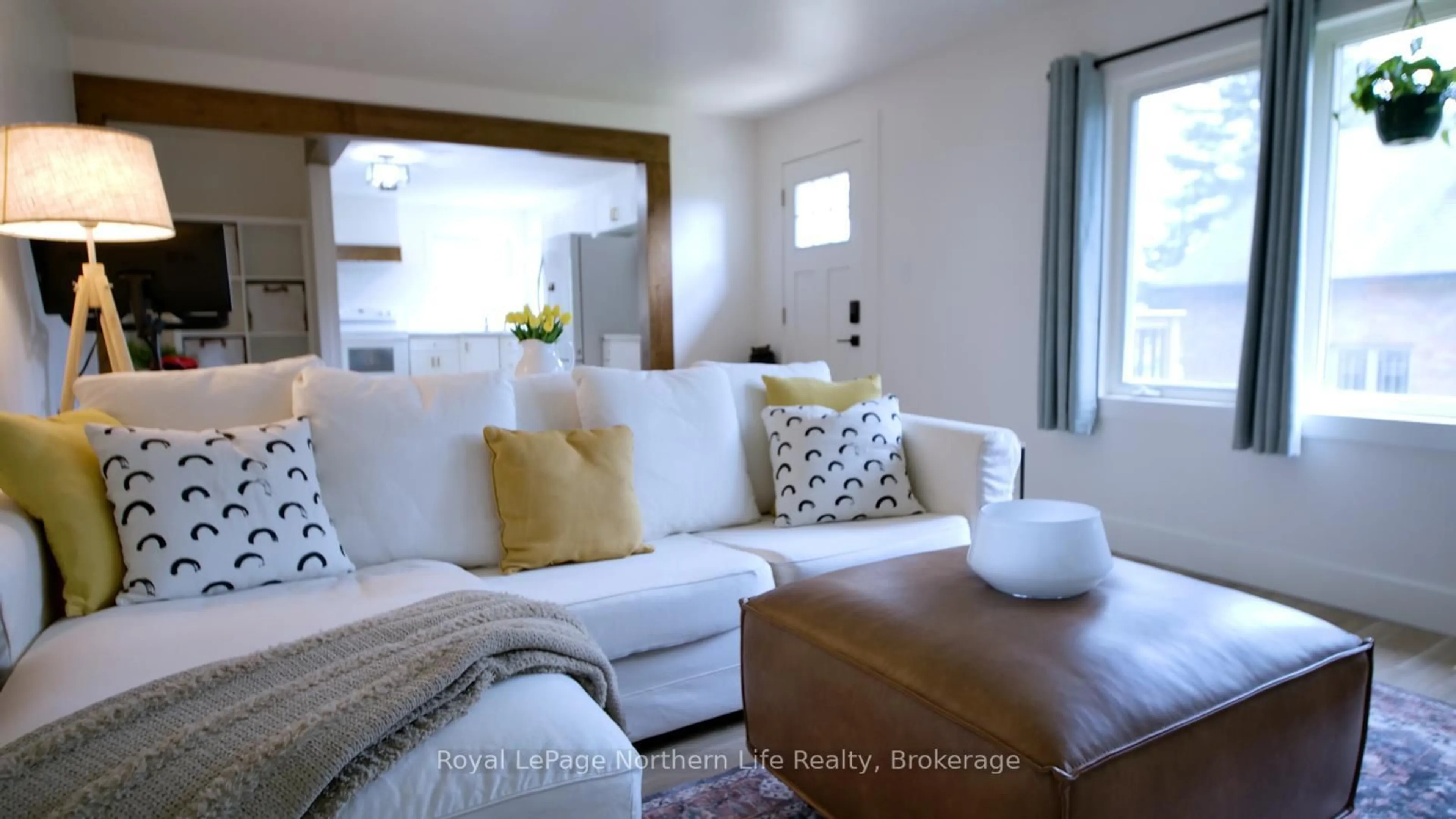 Living room with furniture, wood/laminate floor for 321 Main St, Powassan Ontario P0H 1Z0