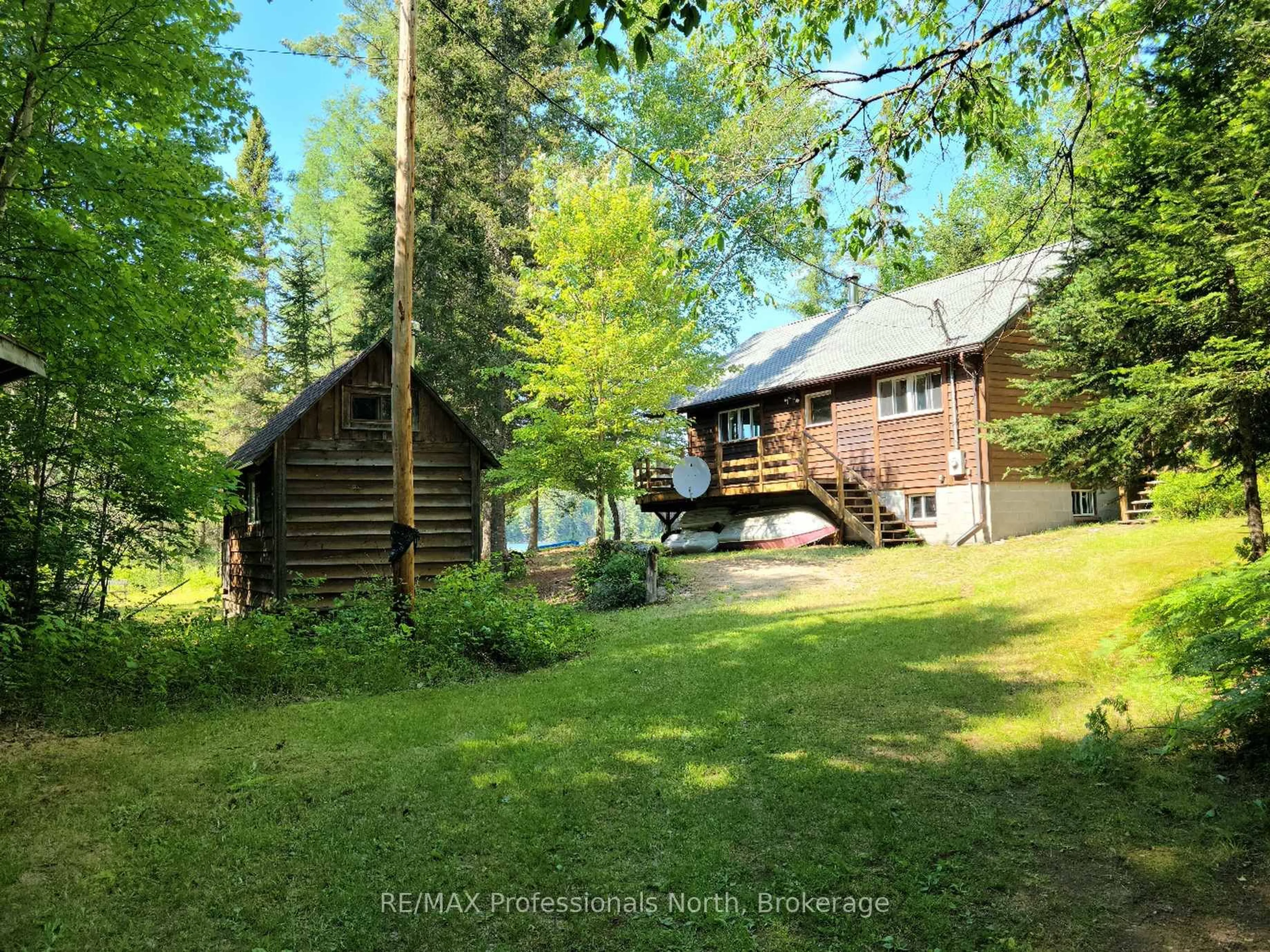A pic from outside/outdoor area/front of a property/back of a property/a pic from drone, forest/trees view for 359 Grass Lake Rd, Kearney Ontario P0A 1M0