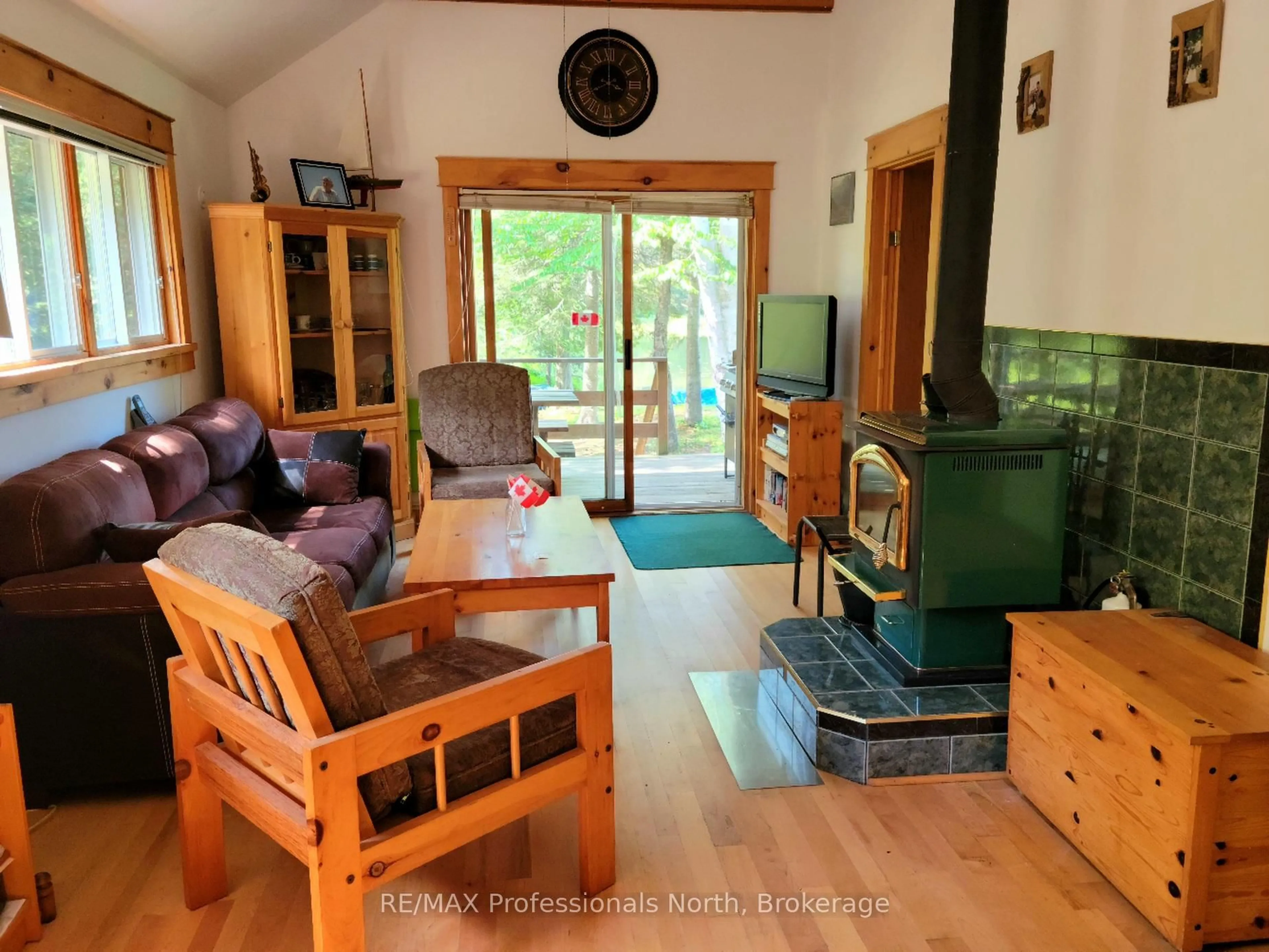 Living room with furniture, wood/laminate floor for 359 Grass Lake Rd, Kearney Ontario P0A 1M0
