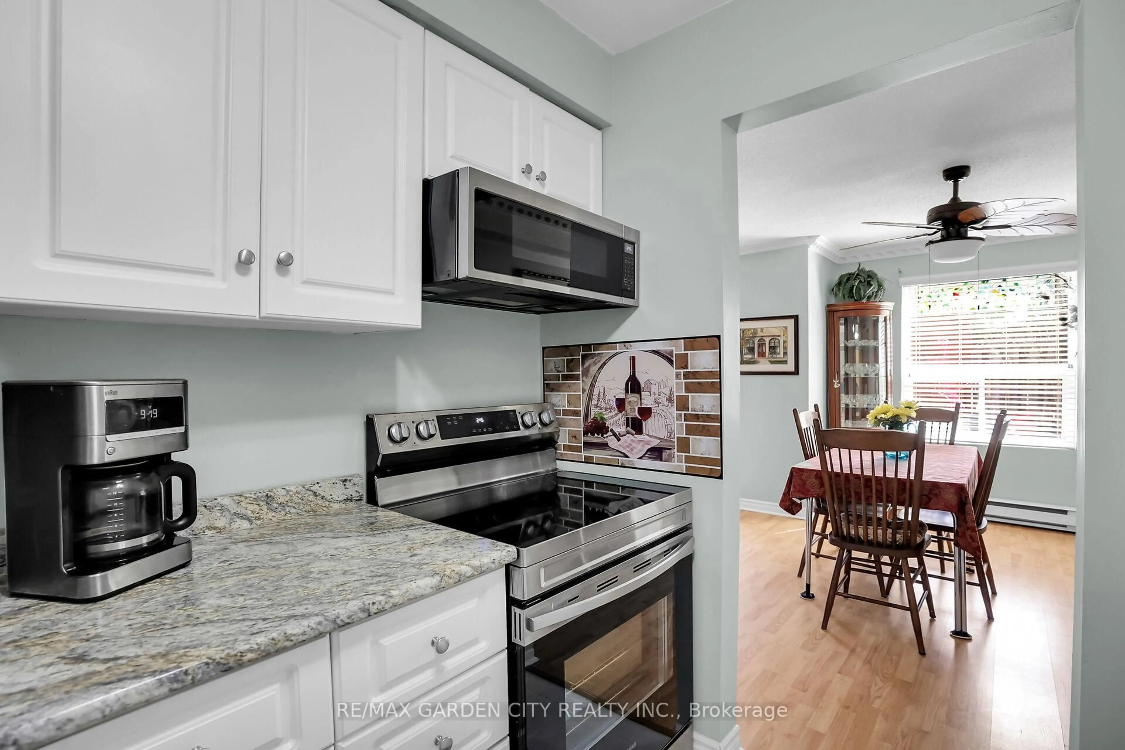 Open concept kitchen, ceramic/tile floor for 4209 Hixon St #108, Lincoln Ontario L3J 0K2