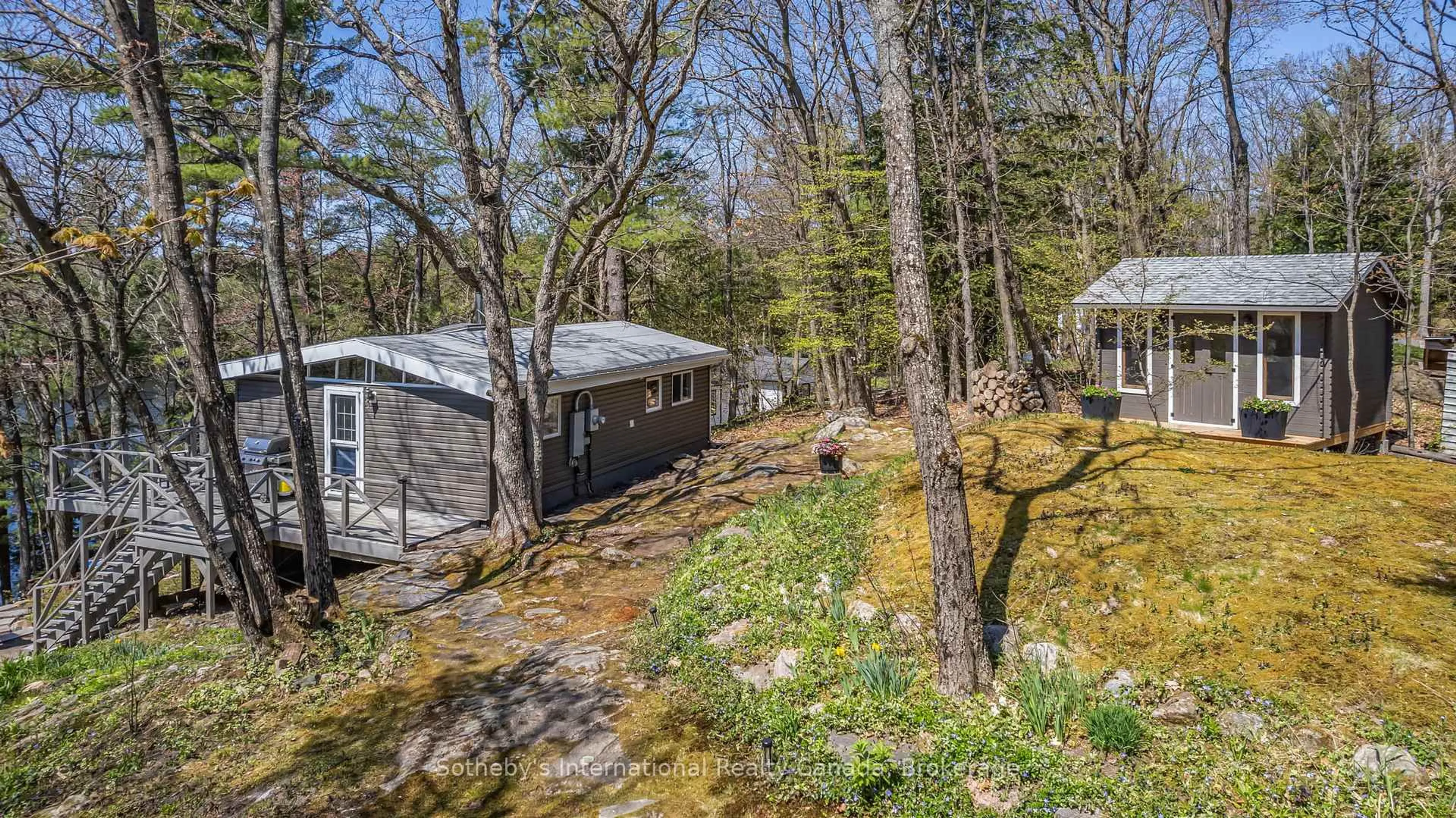 A pic from outside/outdoor area/front of a property/back of a property/a pic from drone, forest/trees view for 1076 Bass Lake Rd #Unit #16, Muskoka Lakes Ontario P0C 1H0