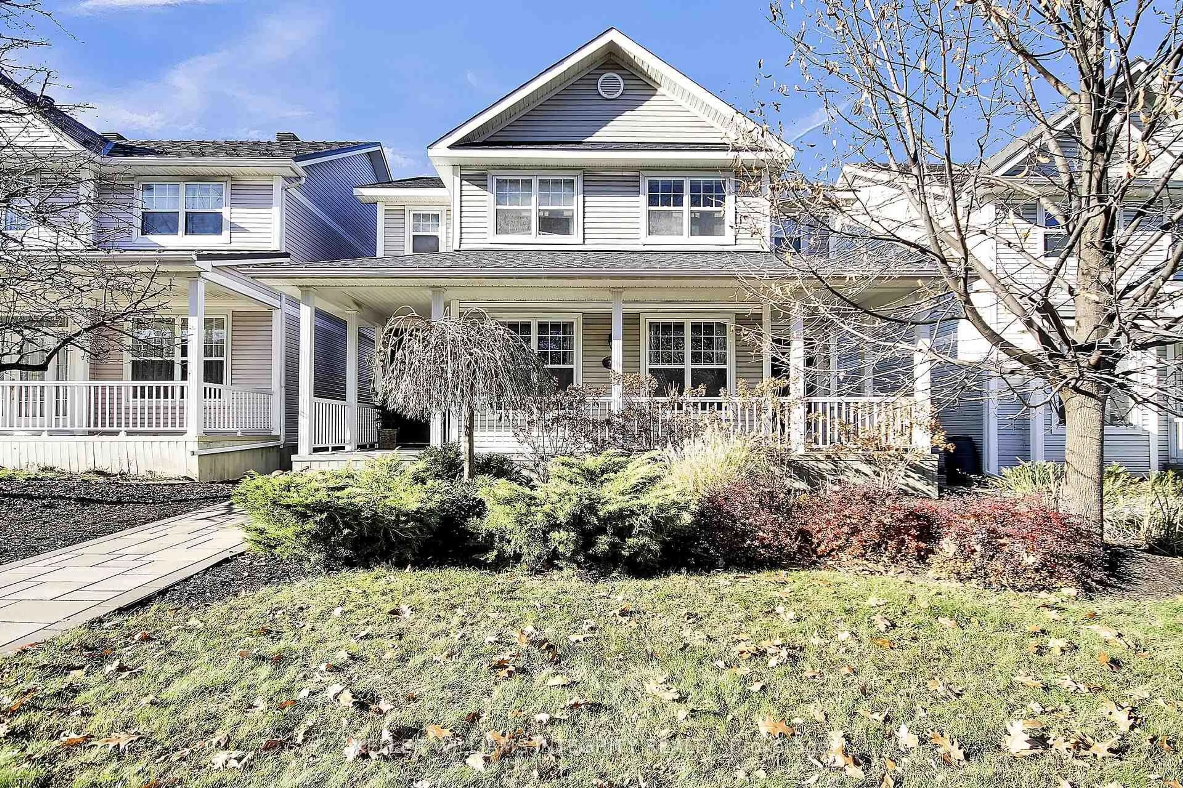 Home with vinyl exterior material, street for 75 Berrigan Dr, Ottawa Ontario K2J 4X2