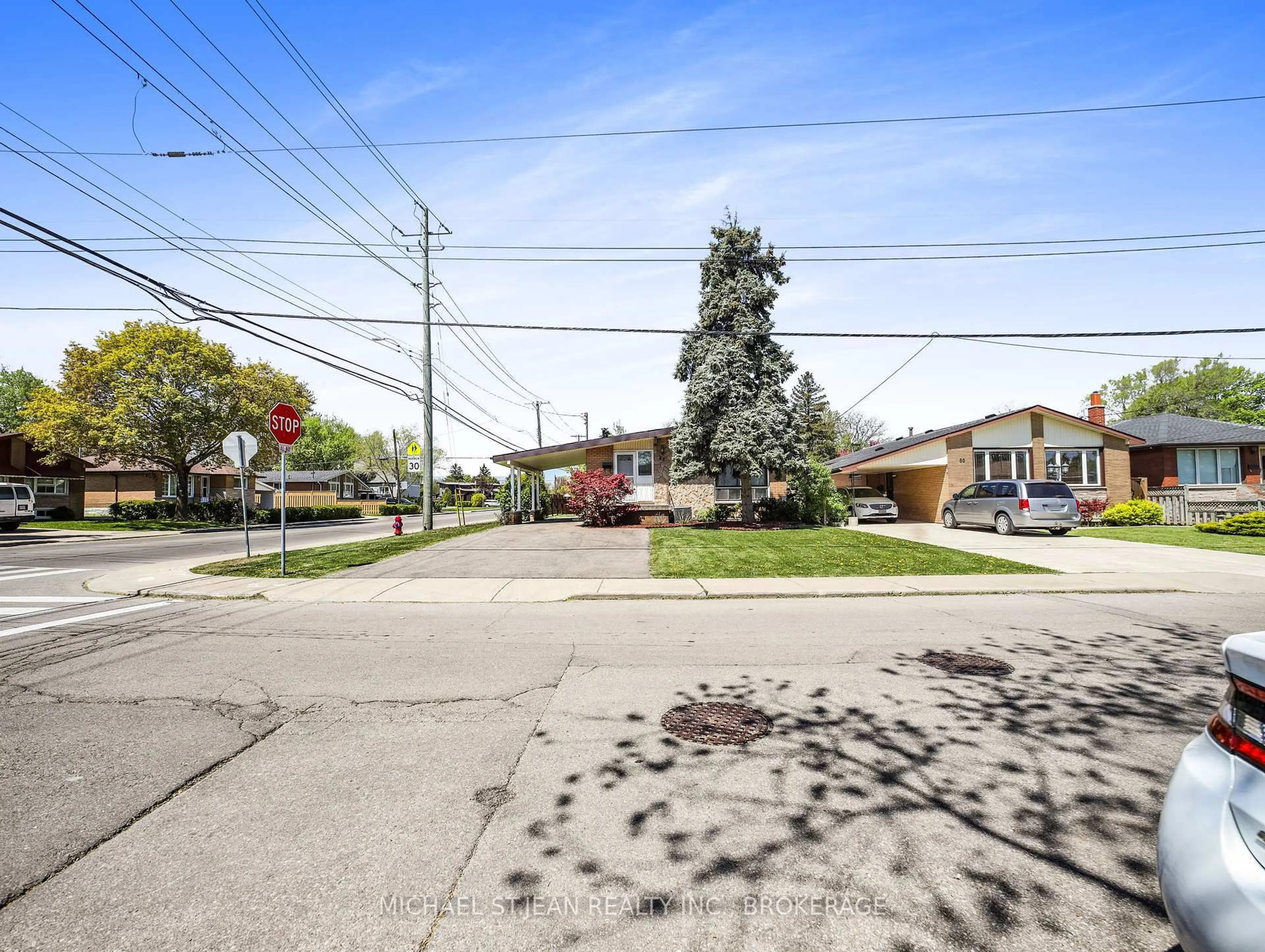 A pic from outside/outdoor area/front of a property/back of a property/a pic from drone, street for 82 Deschene Ave, Hamilton Ontario L9A 3J7
