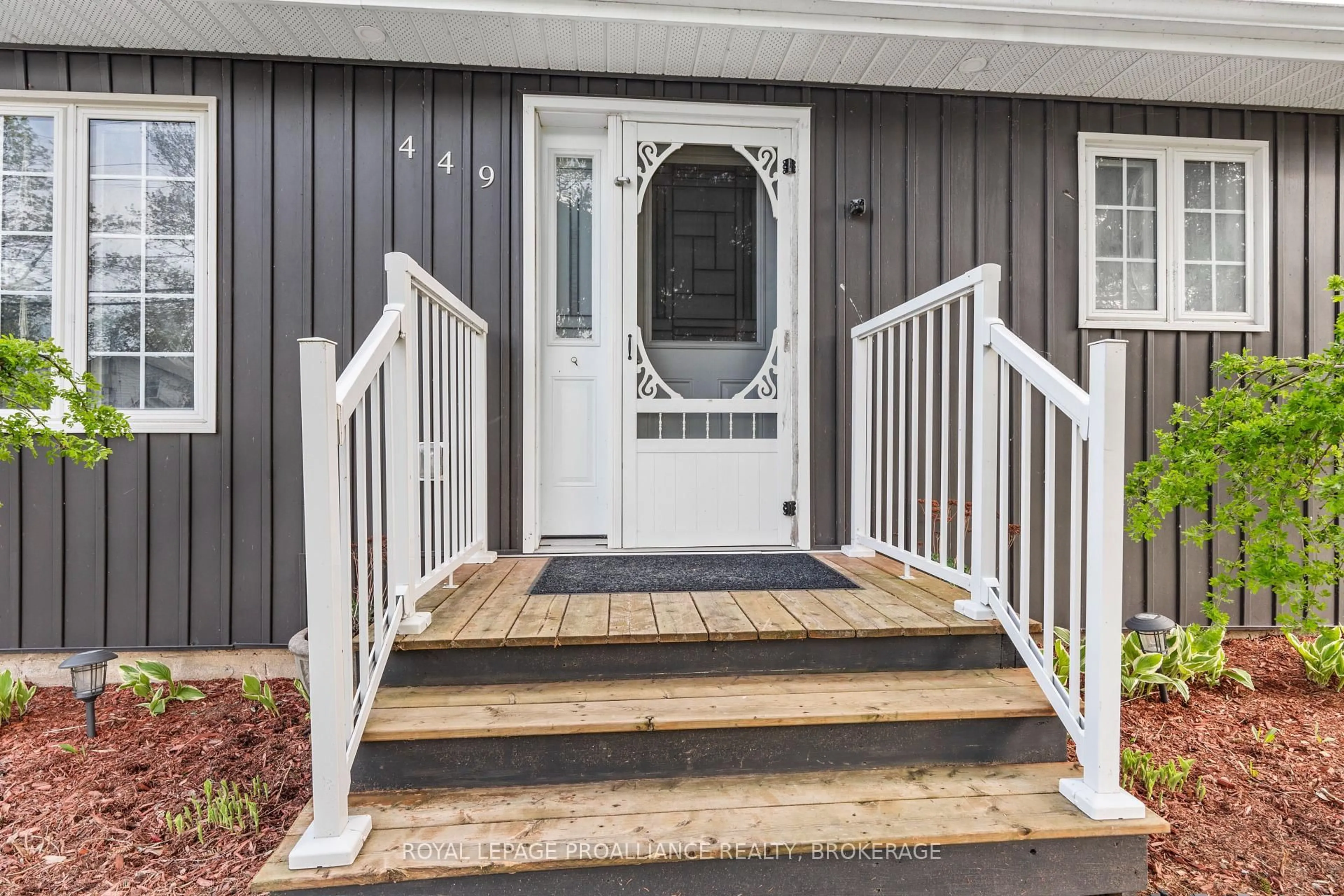 Home with vinyl exterior material, street for 449 Main St, Bath Ontario K0H 1G0