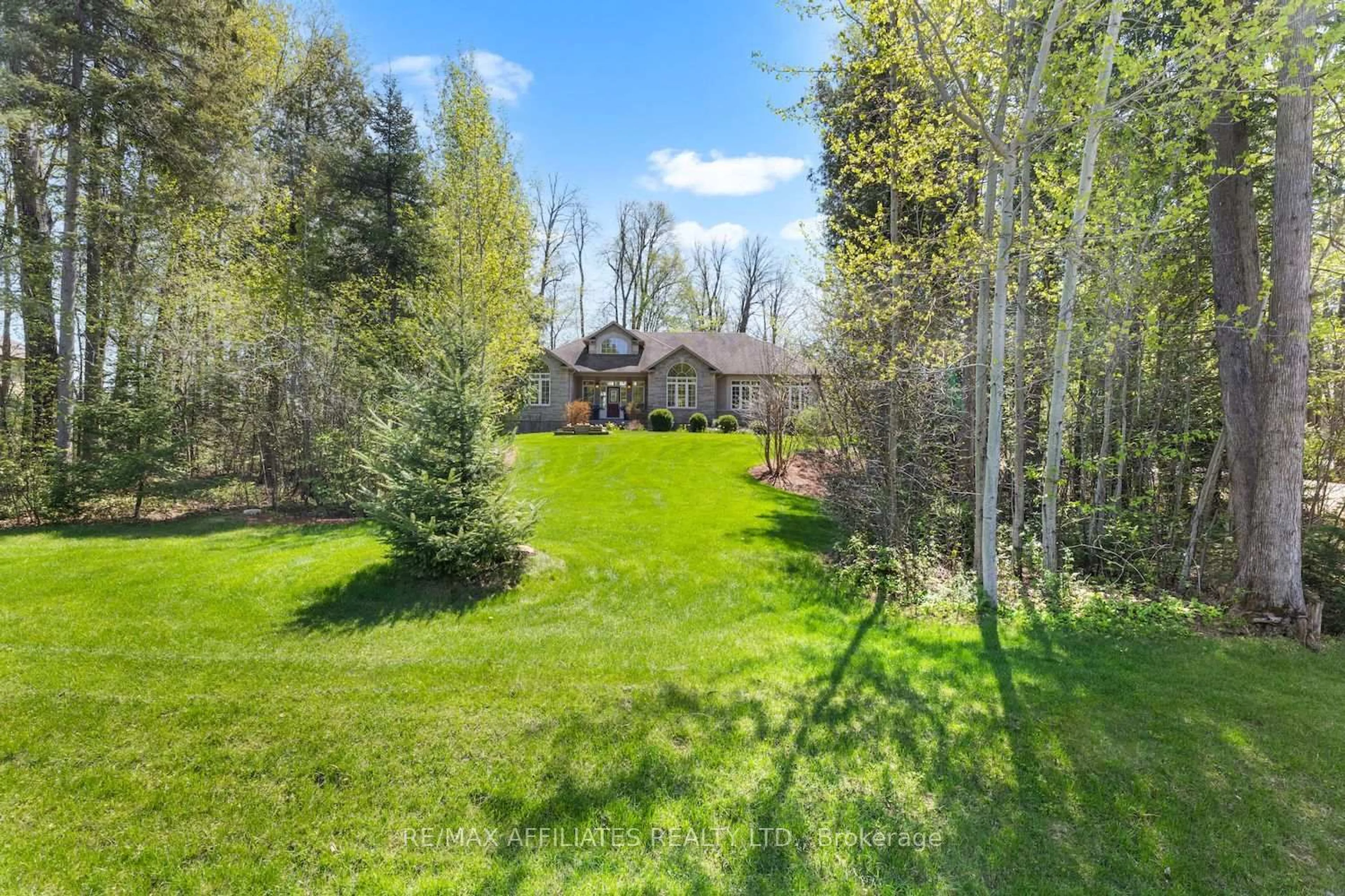 A pic from outside/outdoor area/front of a property/back of a property/a pic from drone, forest/trees view for 382 Ashton Creek Cres, Ashton Ontario K0A 1B0