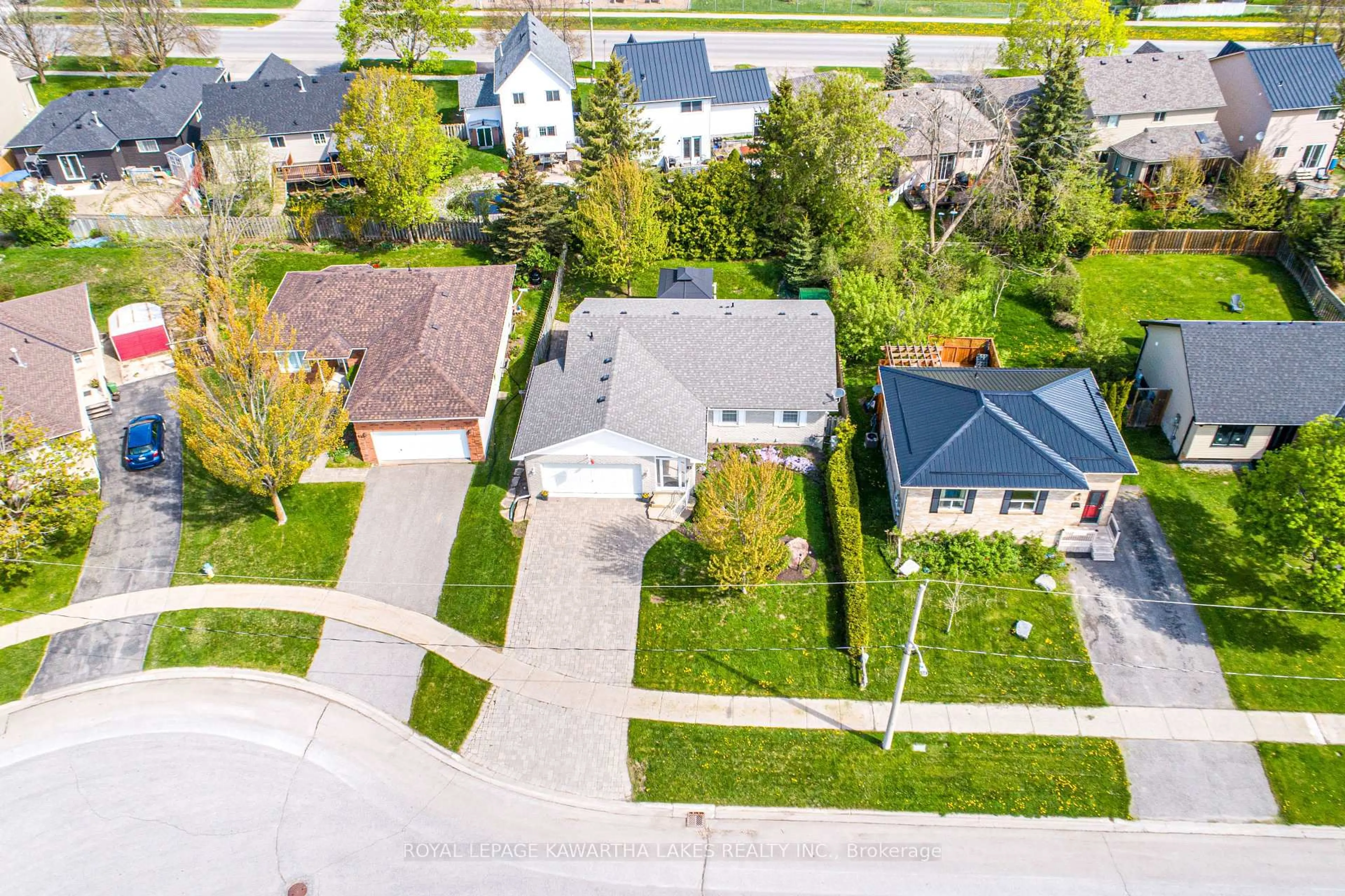 A pic from outside/outdoor area/front of a property/back of a property/a pic from drone, street for 83 Lori Blvd, Kawartha Lakes Ontario K9V 6V7