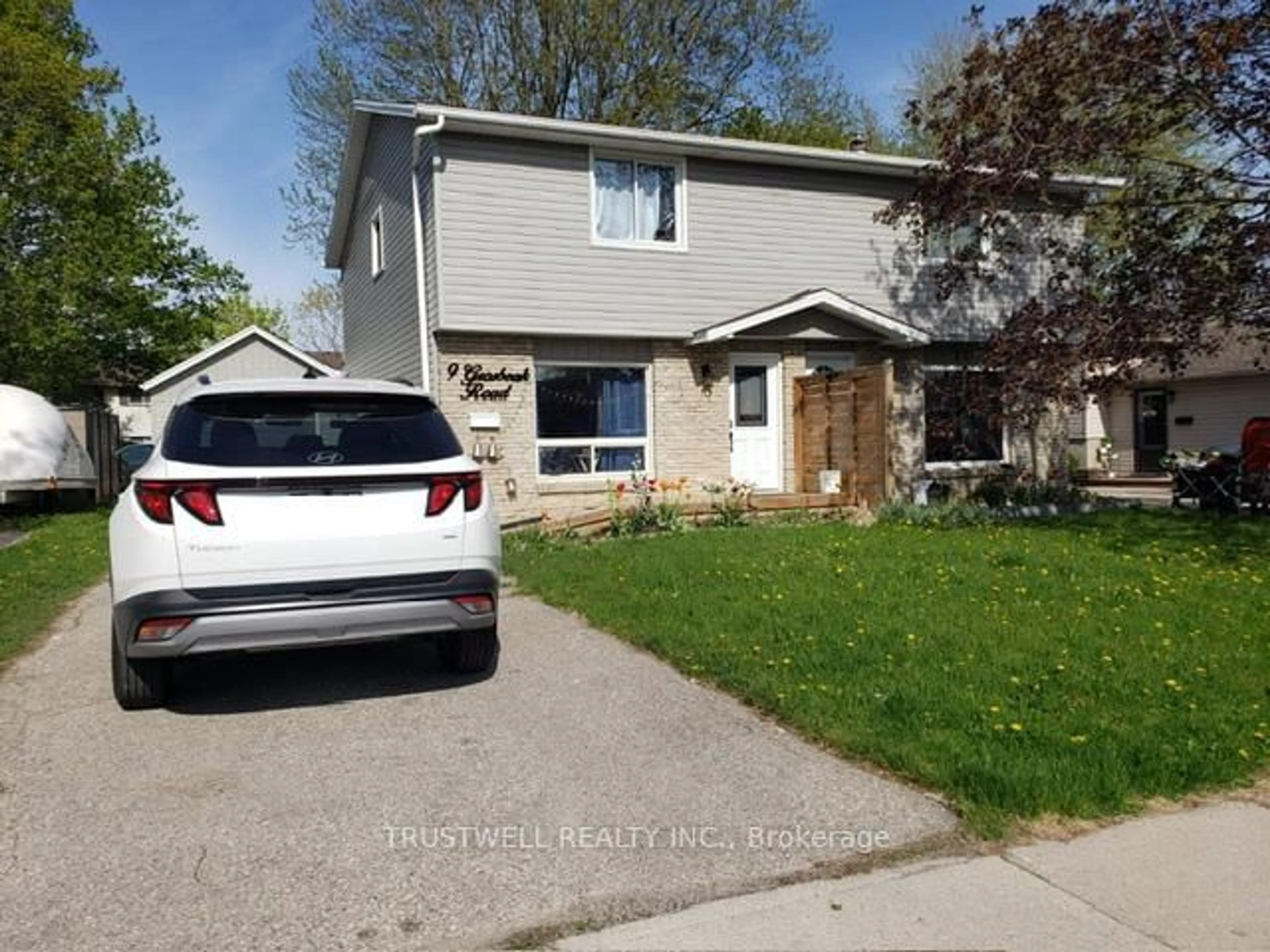 Home with vinyl exterior material, street for 9 Grosbeak Rd, Woolwich Ontario N3B 1V6