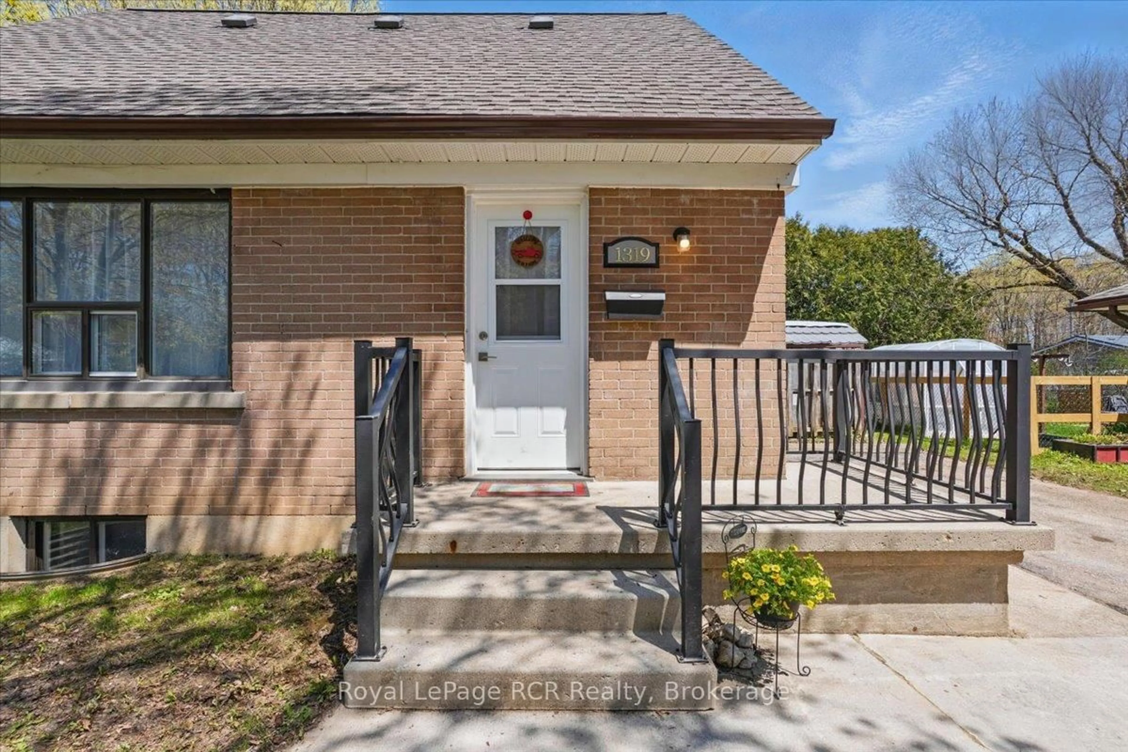 Home with brick exterior material, street for 1319 8th Ave, Owen Sound Ontario N4K 5M4