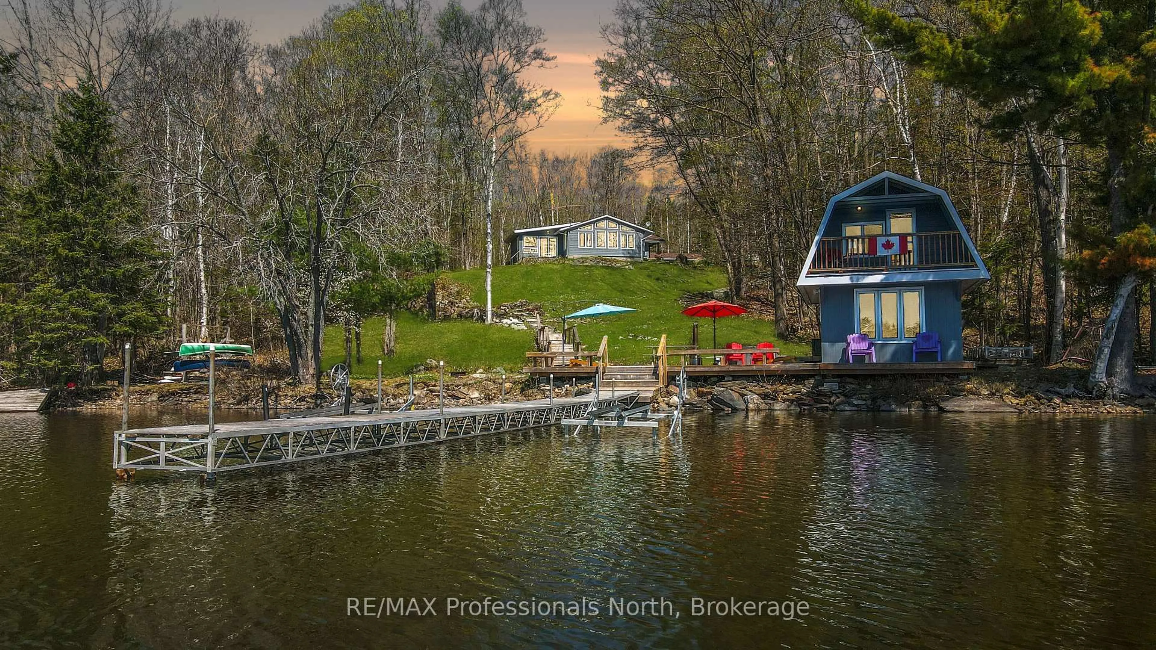 A pic from outside/outdoor area/front of a property/back of a property/a pic from drone, water/lake/river/ocean view for 13914 35 Highway, Minden Hills Ontario K0M 2K0
