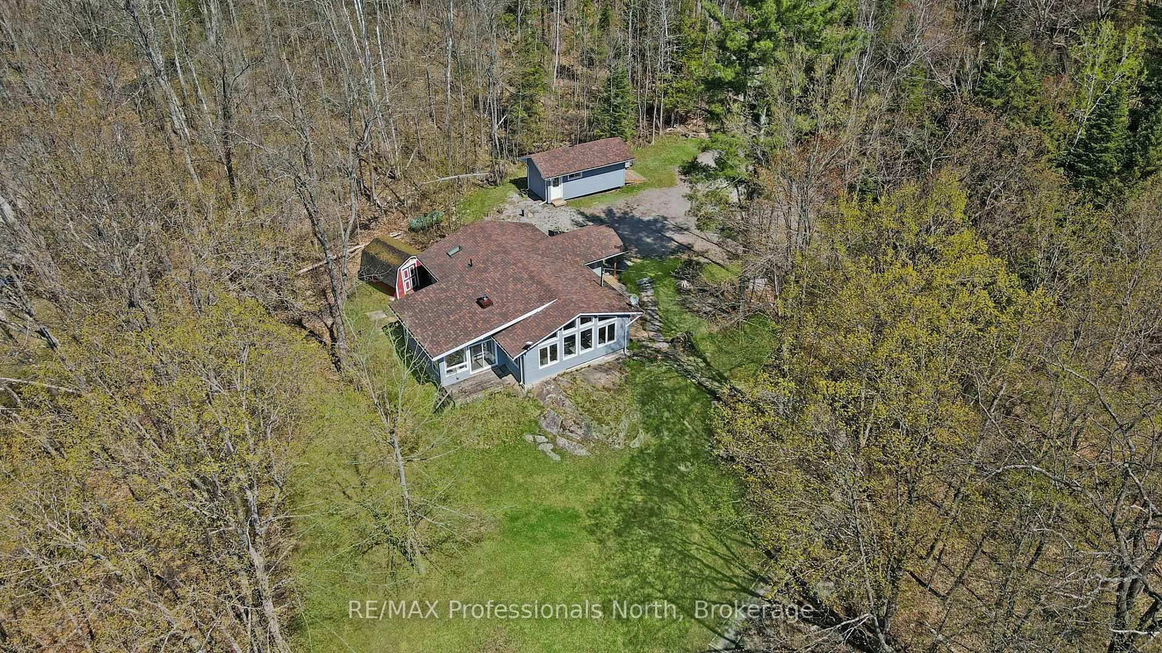 A pic from outside/outdoor area/front of a property/back of a property/a pic from drone, unknown for 13914 Hwy 35 N/A, Minden Hills Ontario K0M 2K0