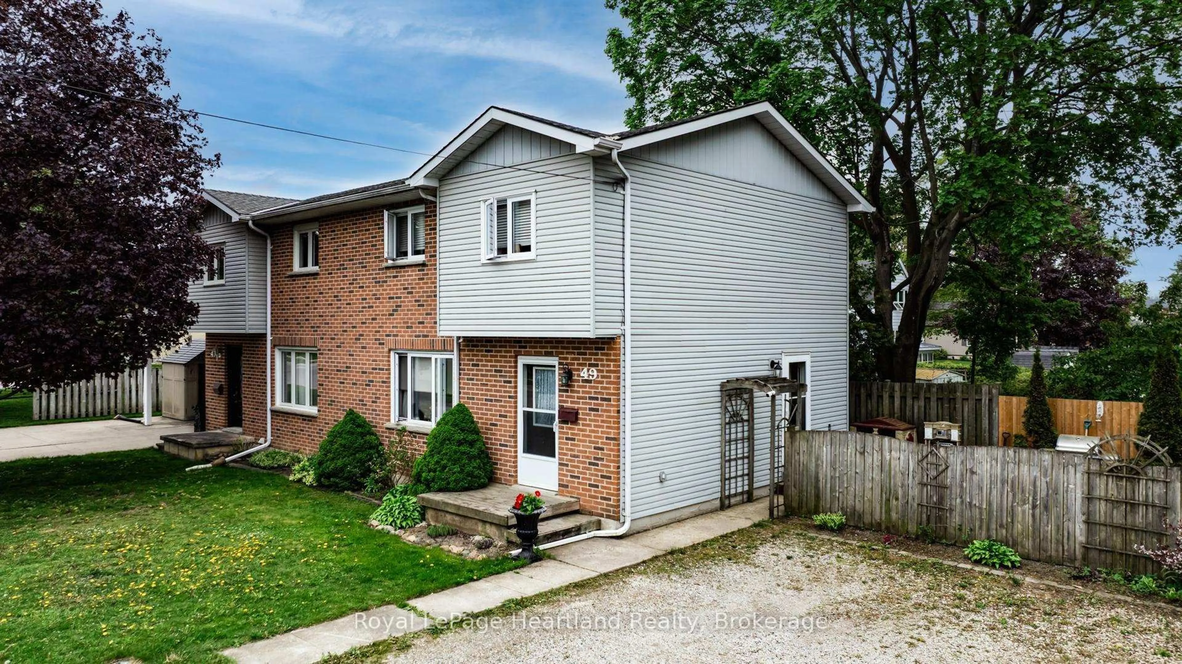 Home with brick exterior material, street for 49 Wellington St, South Huron Ontario N0M 1S2