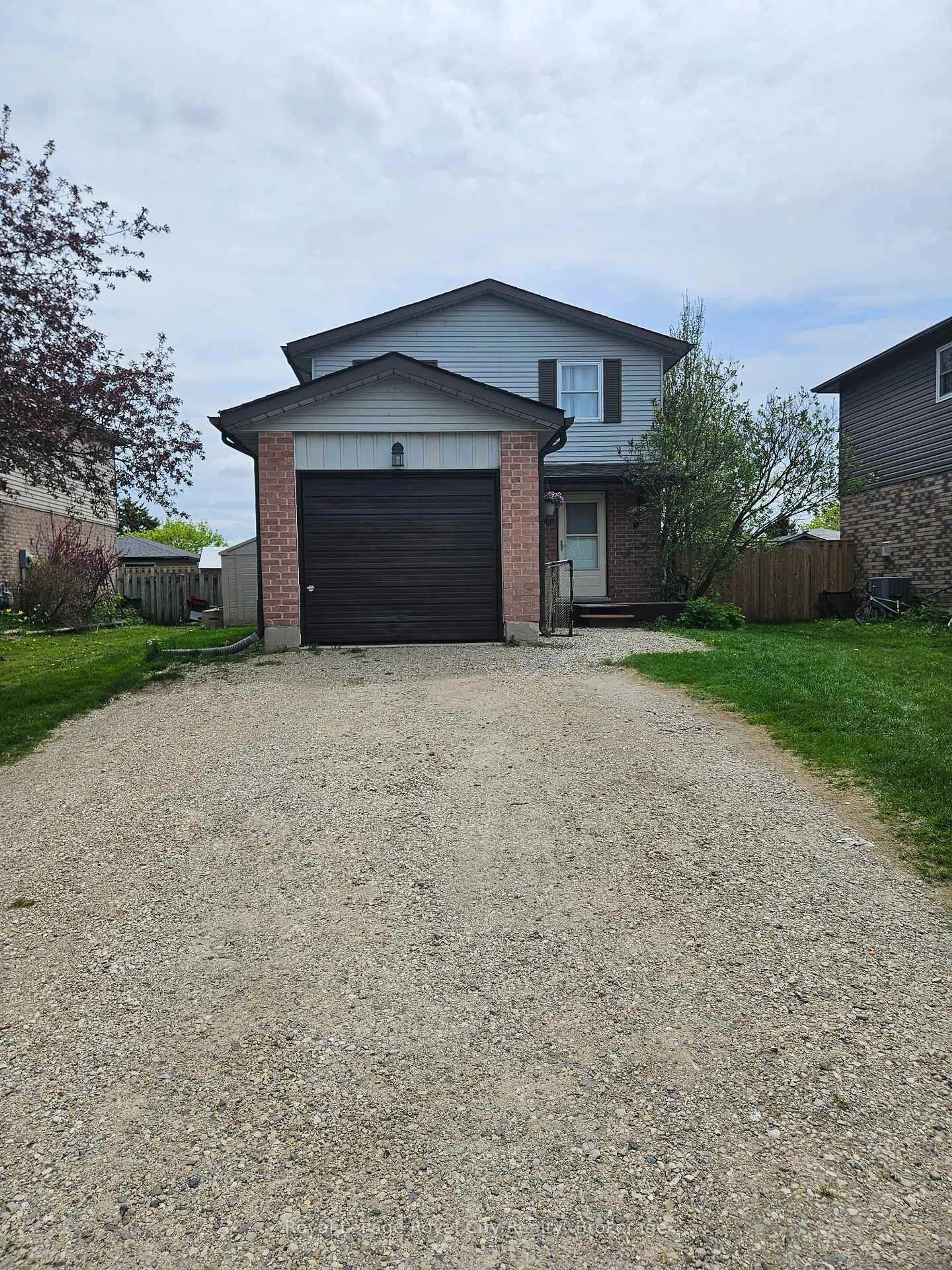 Home with brick exterior material, street for 300 Stornoway Dr, Centre Wellington Ontario N1M 3K6