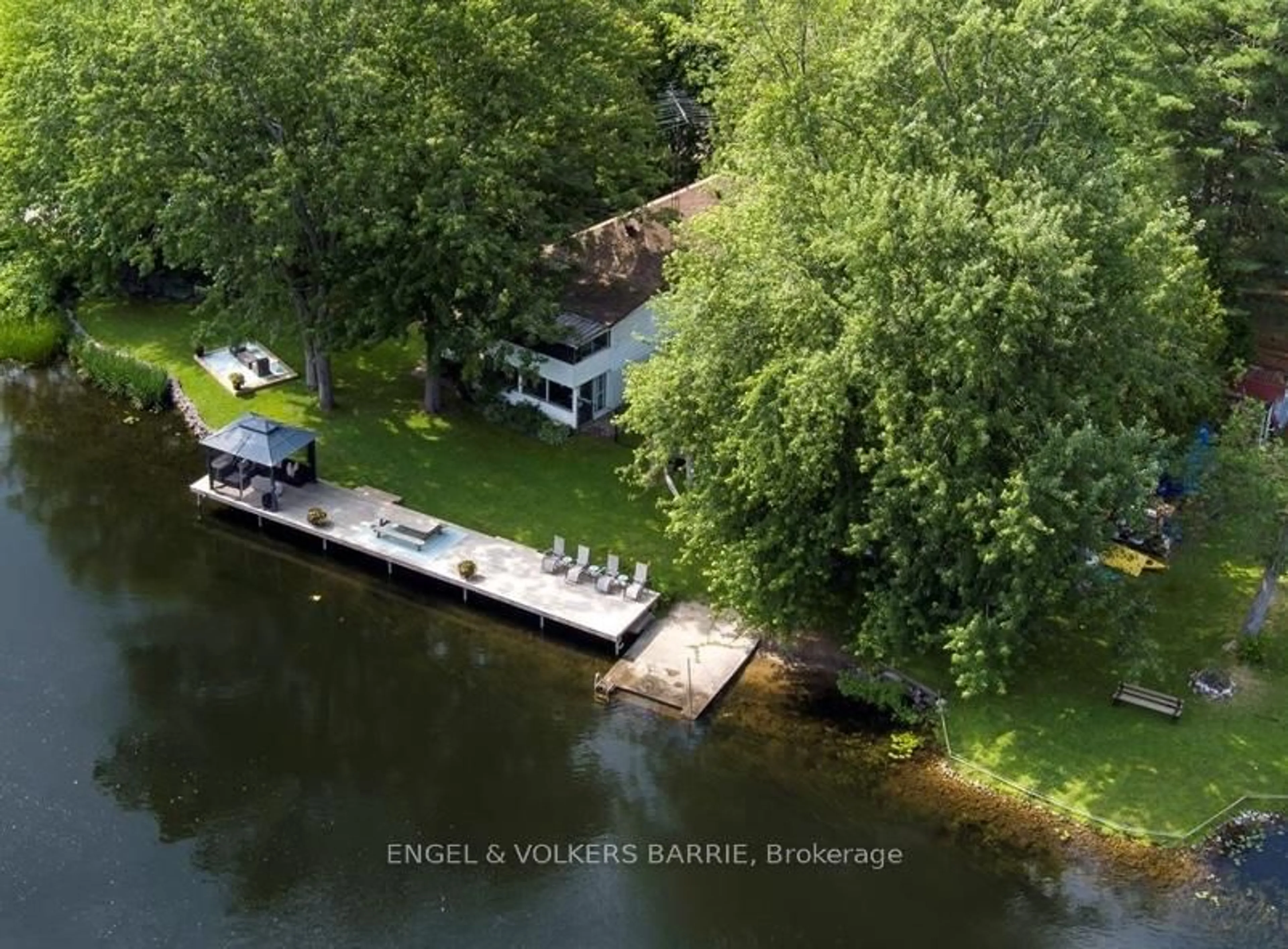 A pic from outside/outdoor area/front of a property/back of a property/a pic from drone, water/lake/river/ocean view for 1057 Severn River Rd, Gravenhurst Ontario P0E 1N0