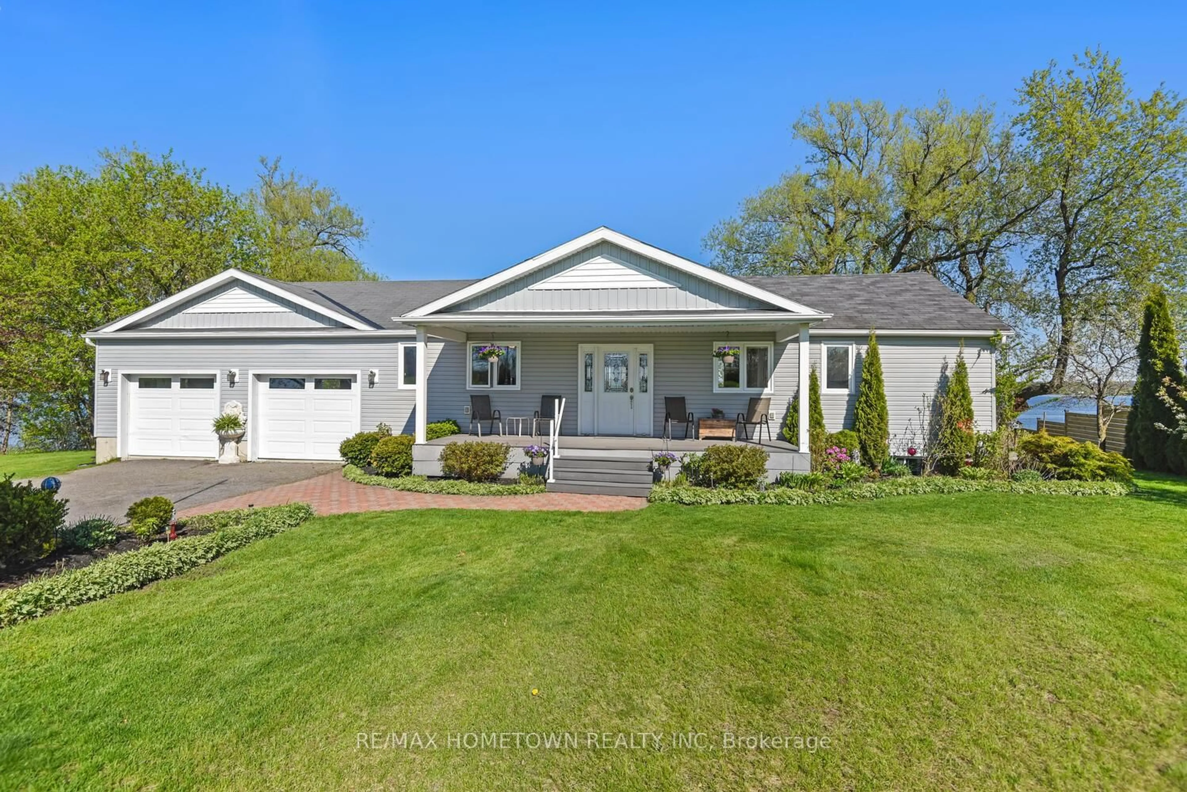Home with vinyl exterior material, street for 1435 County Road 2 Rd, Augusta Ontario K0E 1T0
