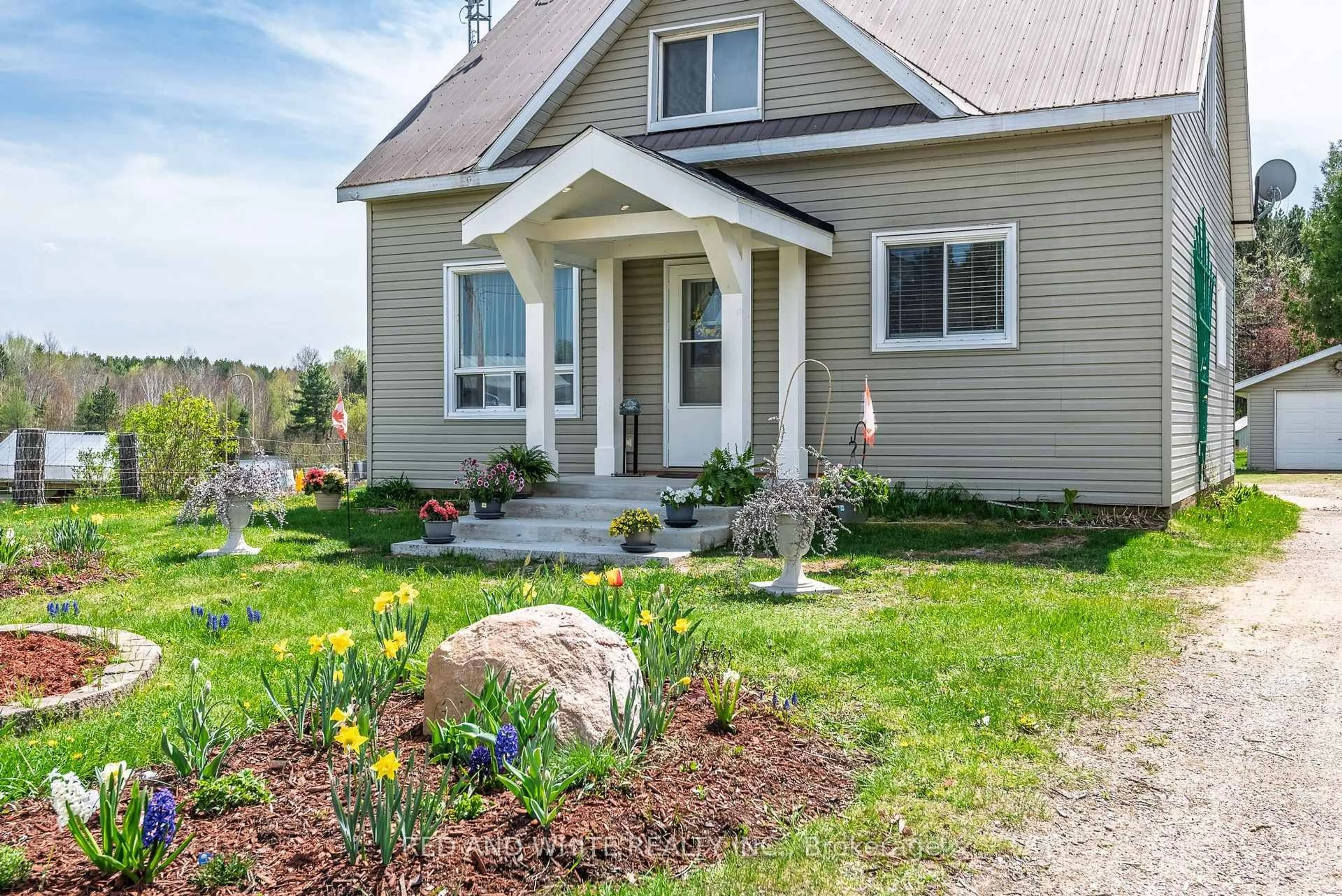 Home with vinyl exterior material, street for 2683 Round Lake Rd, Round Lake Centre Ontario K0J 2J0
