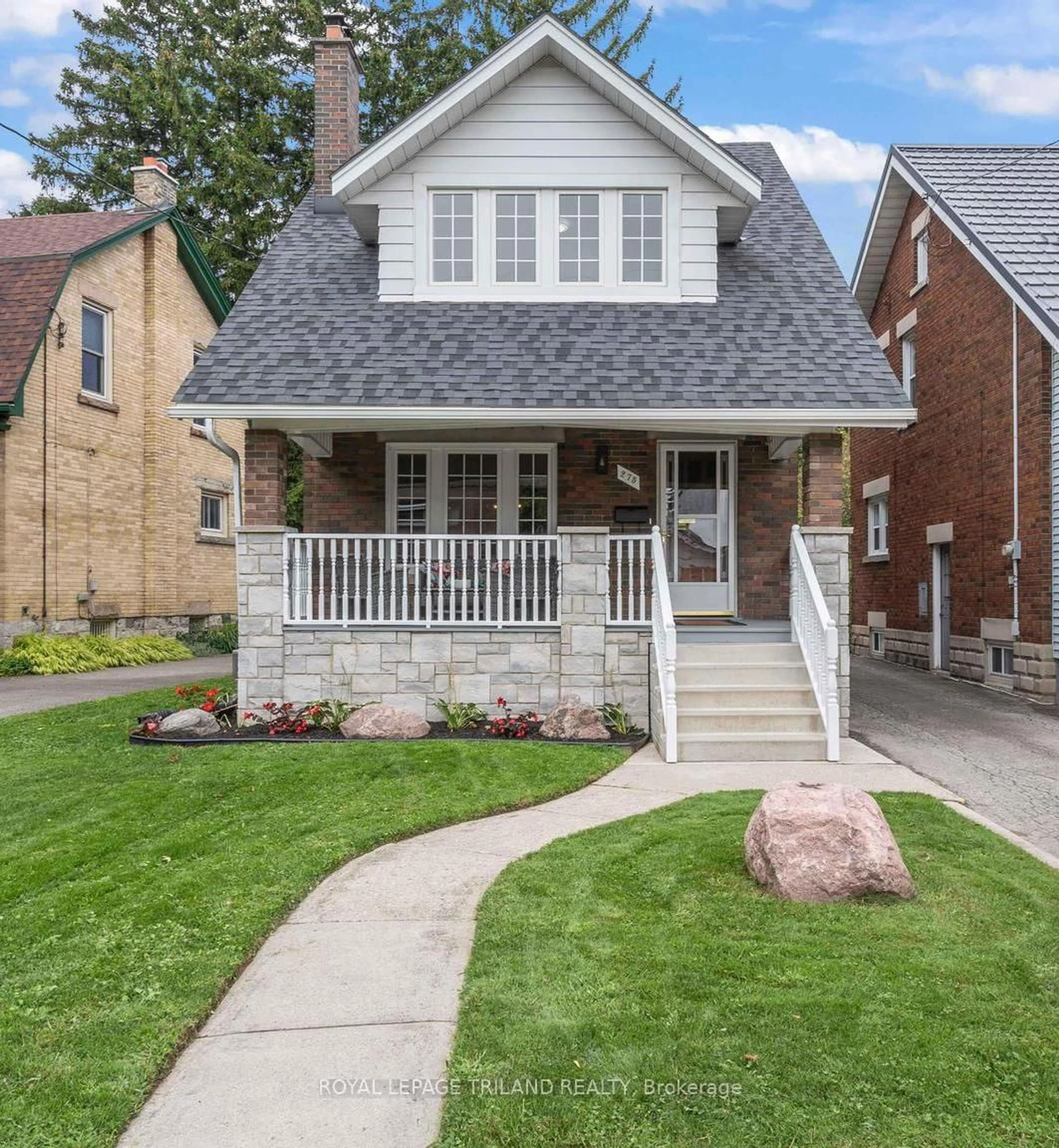 Home with brick exterior material, street for 275 RIDOUT St, London South Ontario N6C 3Y7