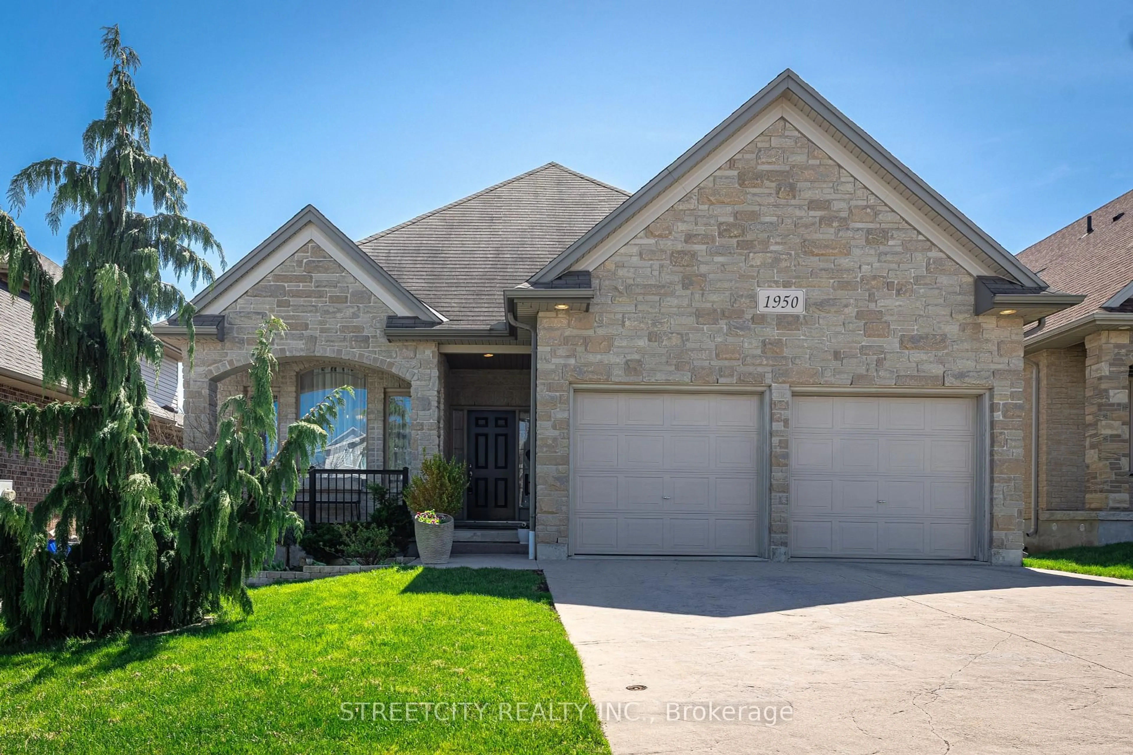 Home with brick exterior material, street for 1950 Beaverbrook Ave, London North Ontario N6H 5X6