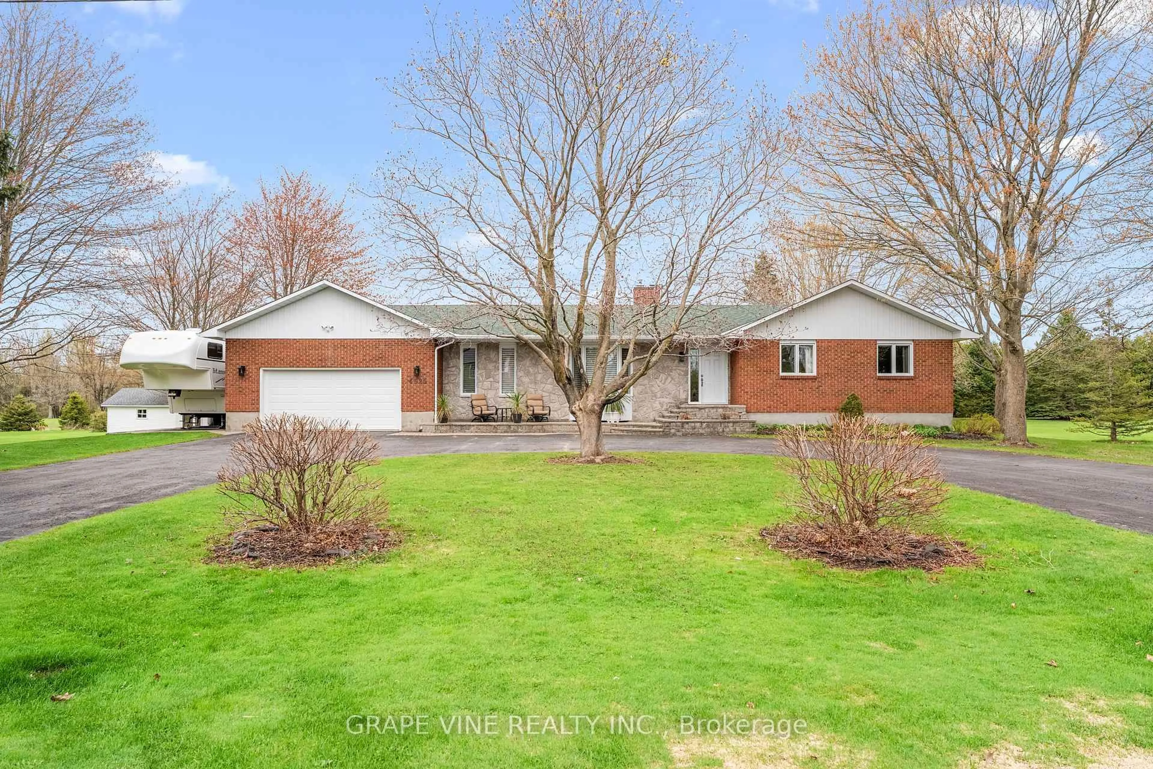 A pic from outside/outdoor area/front of a property/back of a property/a pic from drone, street for 4525 Mcneely Rd, Navan Ontario K4B 1J1