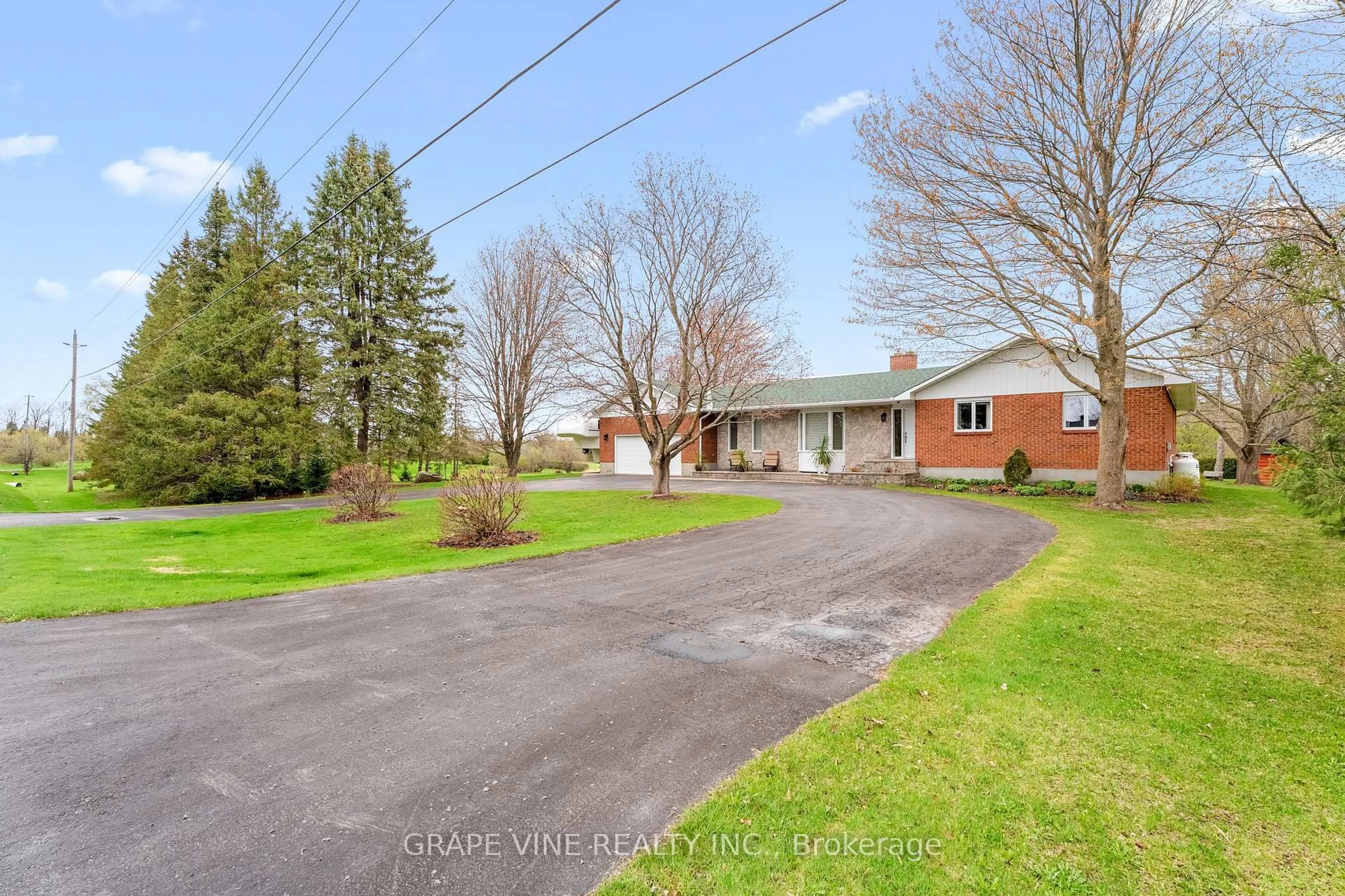 A pic from outside/outdoor area/front of a property/back of a property/a pic from drone, street for 4525 Mcneely Rd, Navan Ontario K4B 1J1