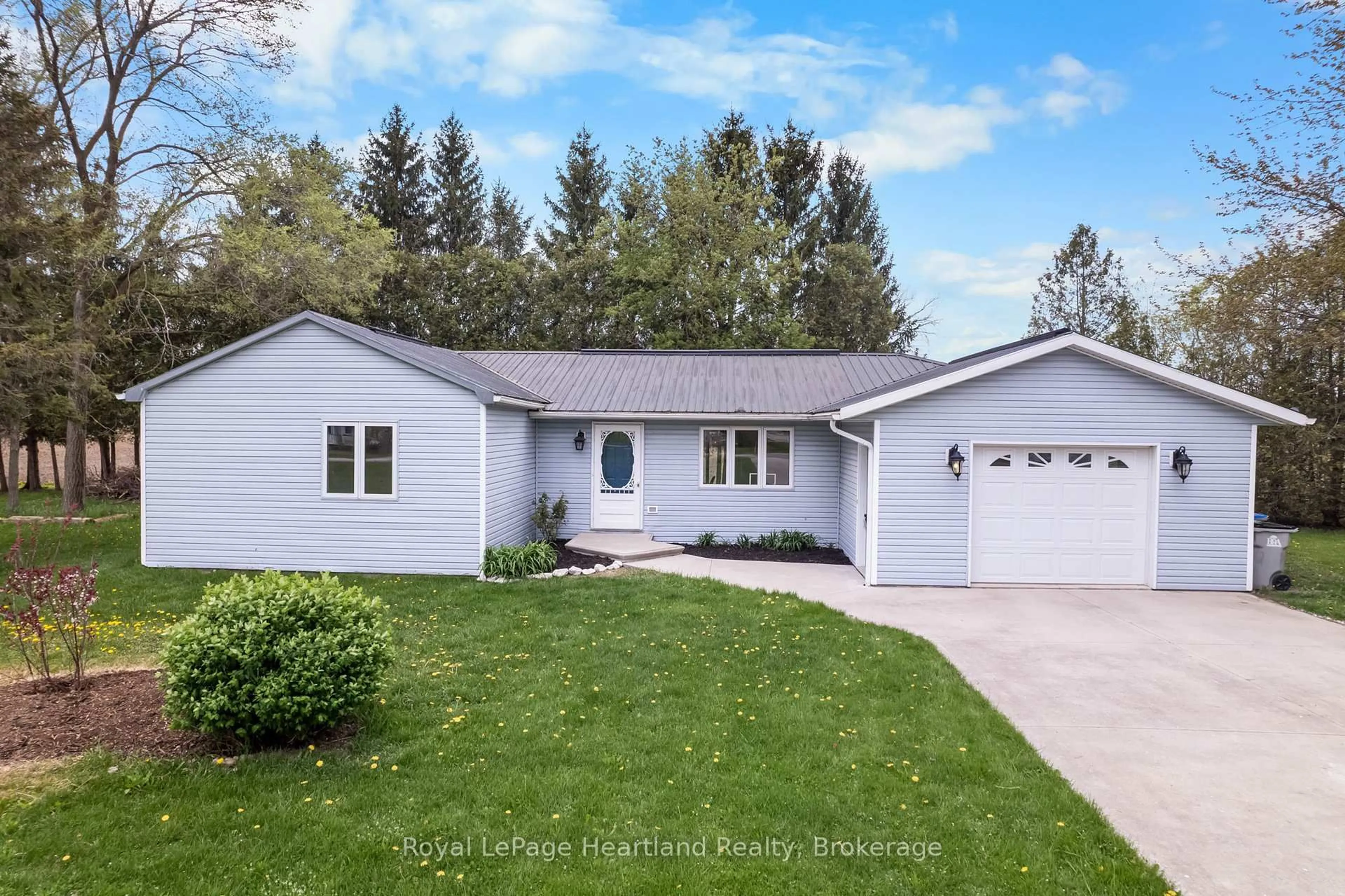 Home with vinyl exterior material, street for 322 Main St, Central Huron Ontario N0M 2H0
