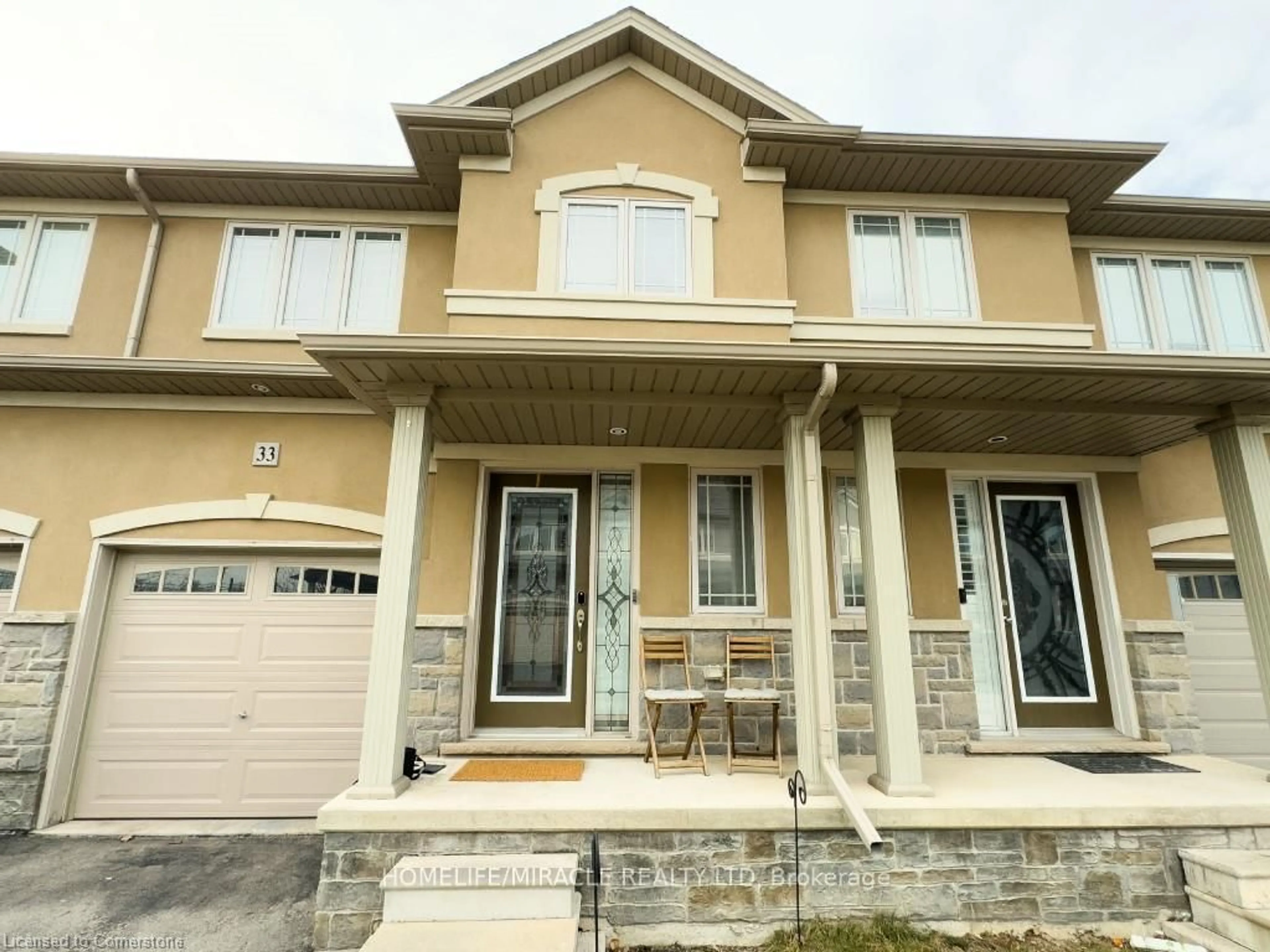 Home with vinyl exterior material, street for 615 Rymal Rd #33, Hamilton Ontario L8W 0B6