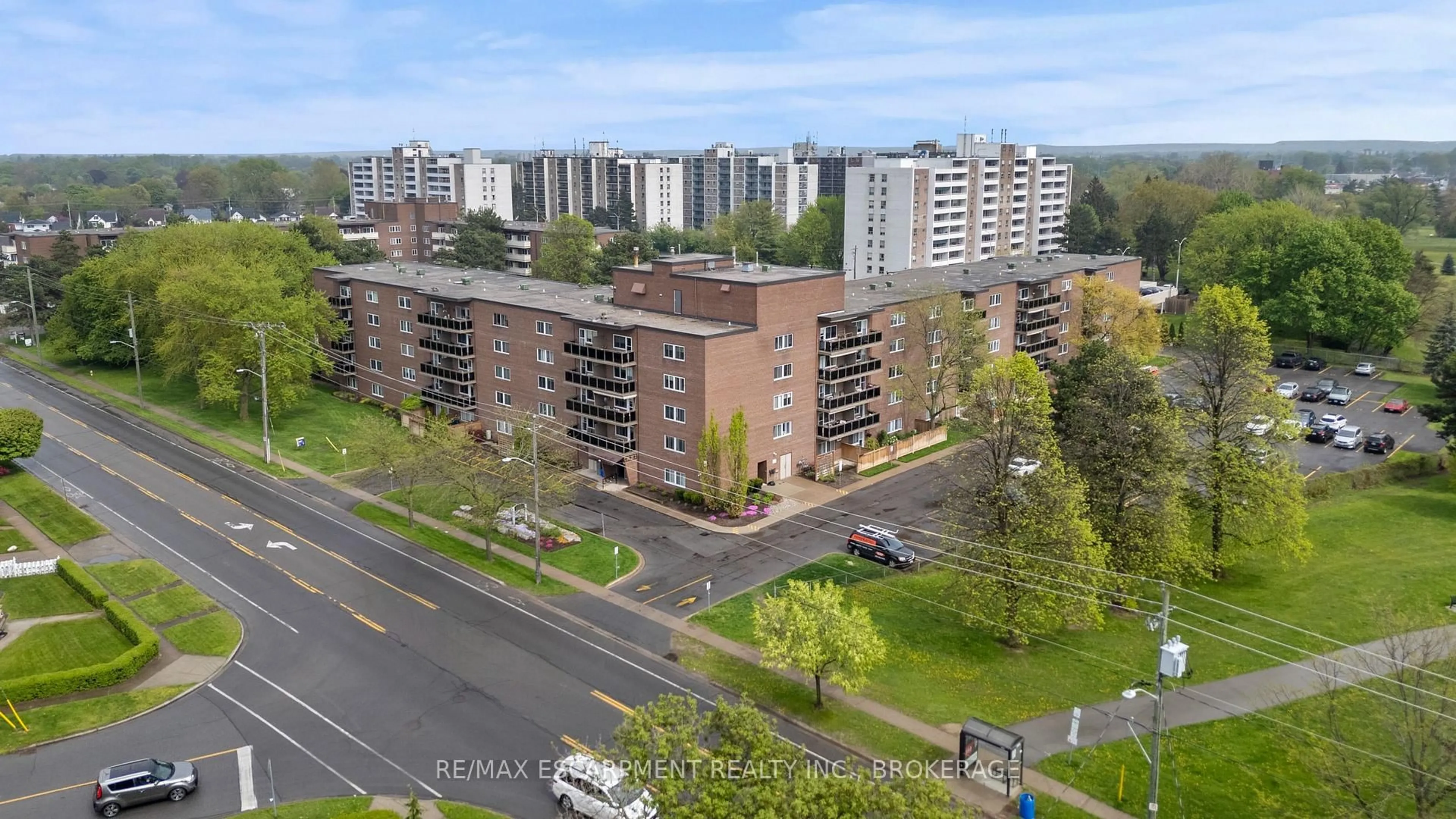 A pic from outside/outdoor area/front of a property/back of a property/a pic from drone, city buildings view from balcony for 196 SCOTT St #115, St. Catharines Ontario L2N 5T2