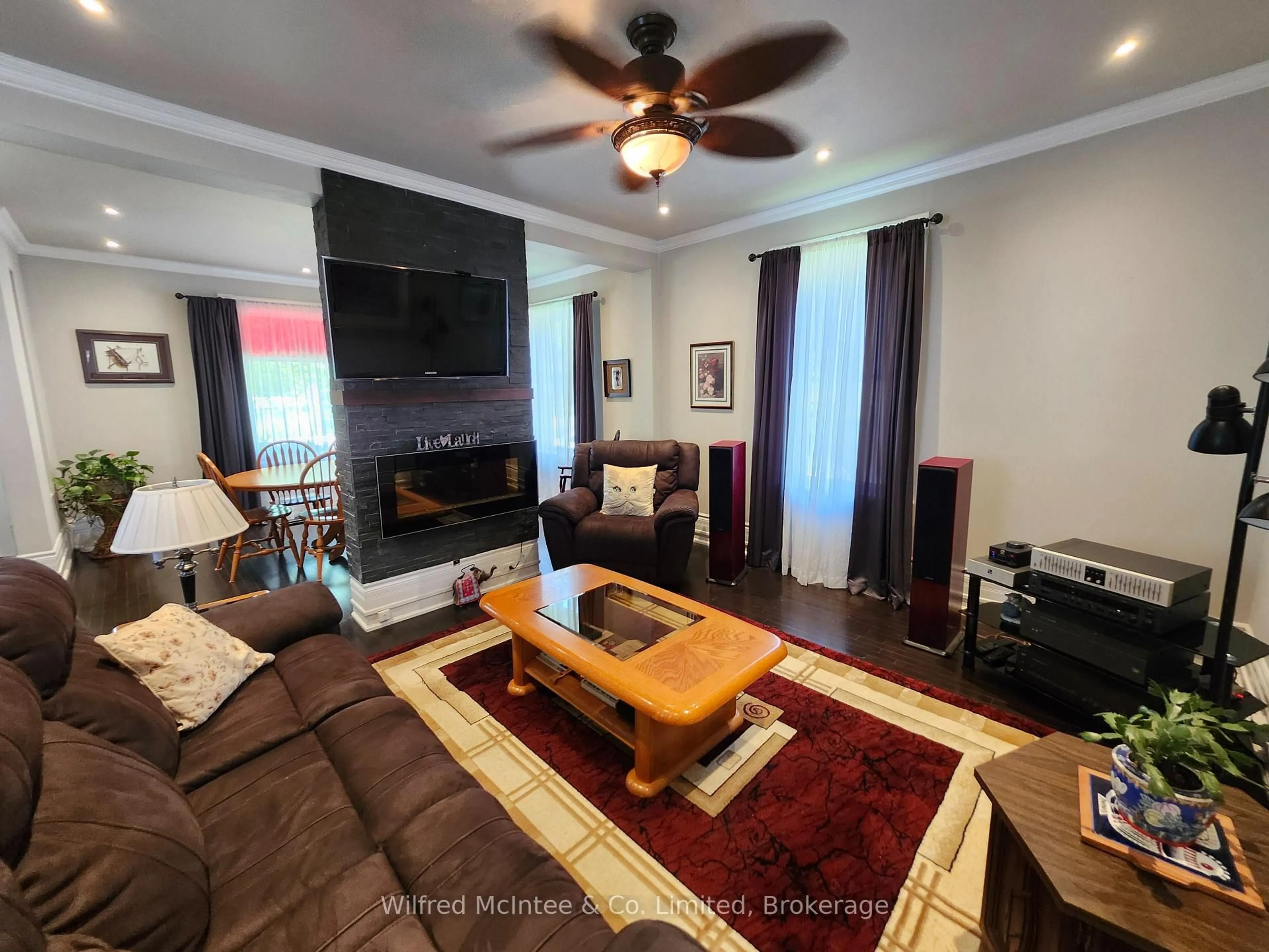 Living room with furniture, wood/laminate floor for 83 Richmond St, Bluewater Ontario N0M 1X0