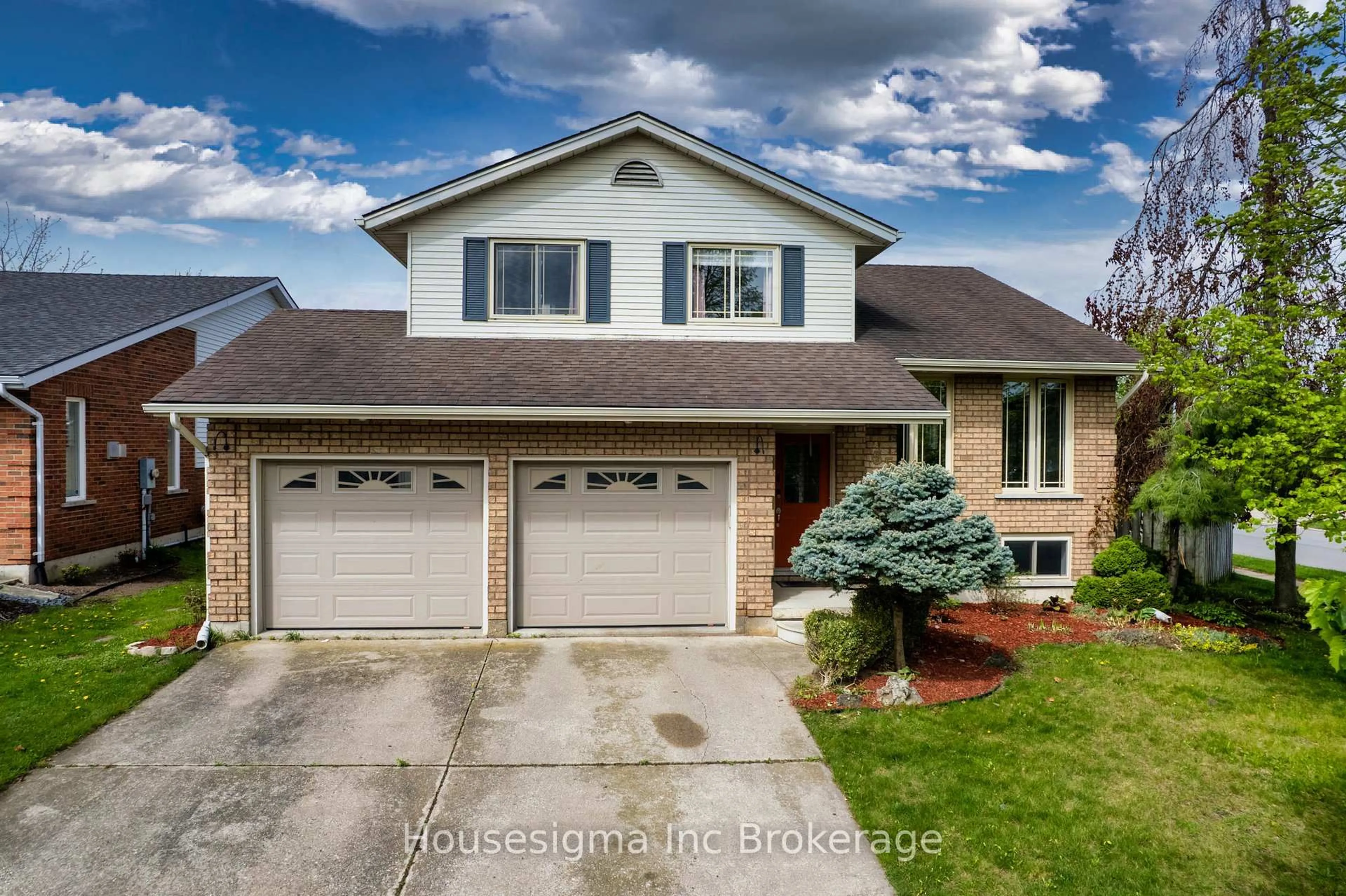 Home with vinyl exterior material, street for 55 Ortona St, Woodstock Ontario N4T 1M6