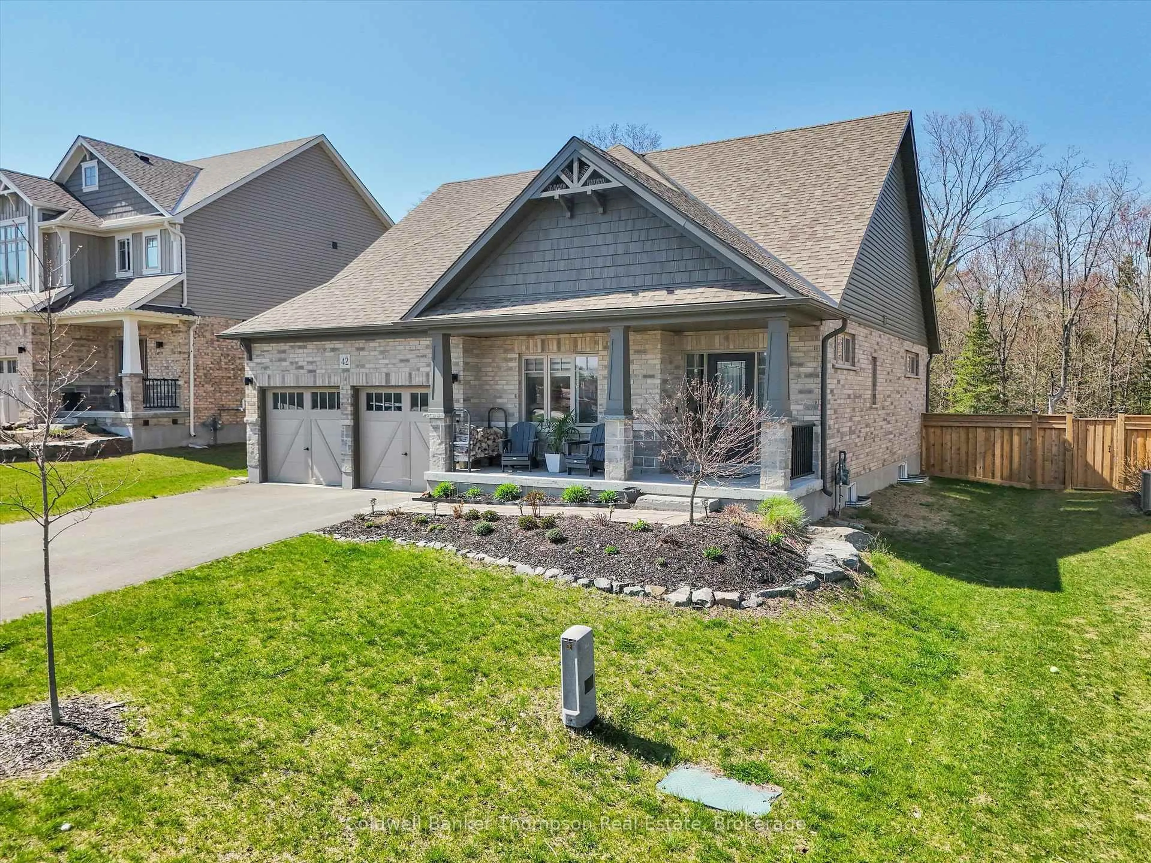 Home with brick exterior material, street for 42 Woodstream Dr, Huntsville Ontario P1H 0B7