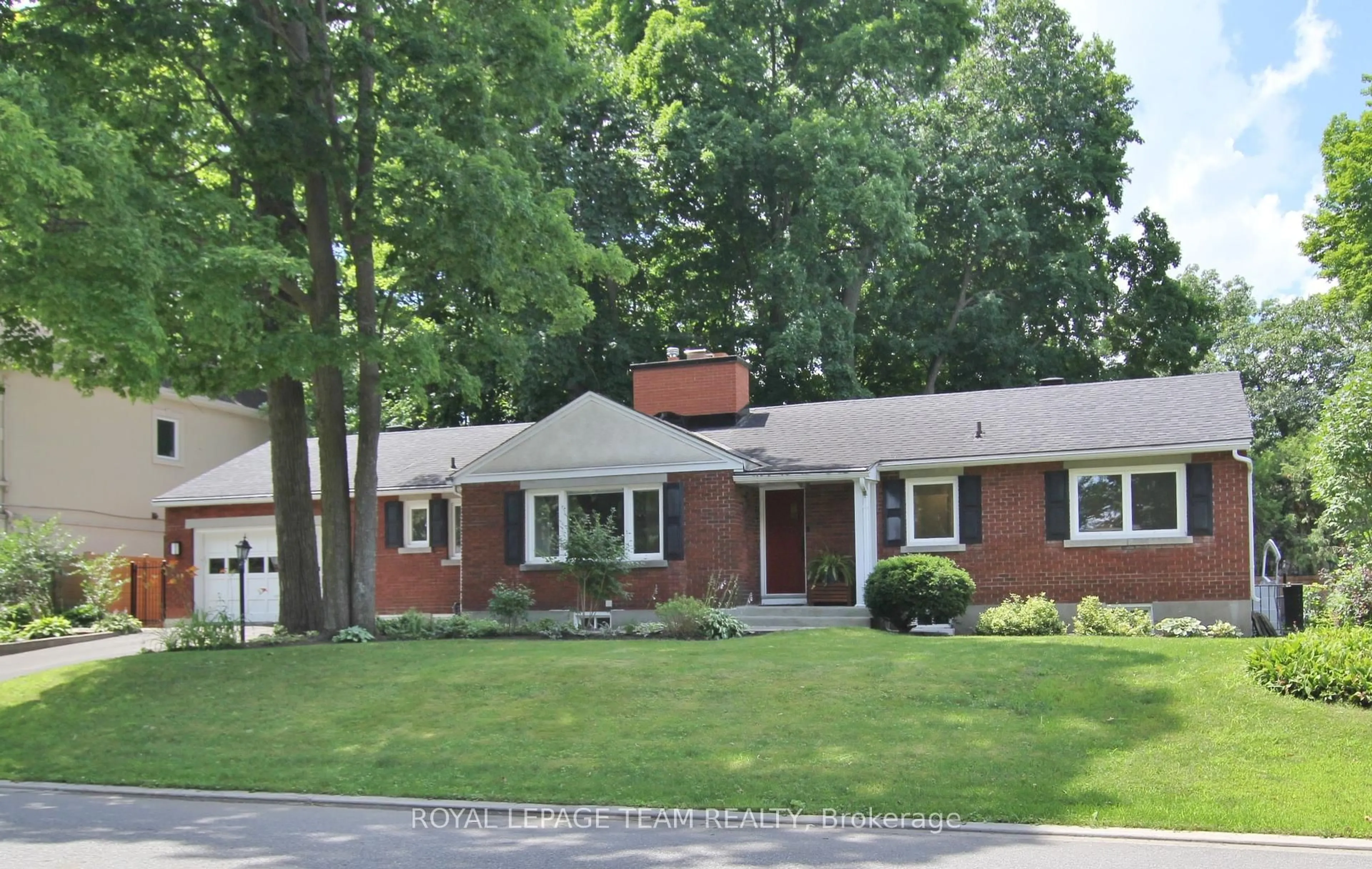Home with brick exterior material, street for 2176 Woodcrest Rd, Ottawa Ontario K1H 6H8