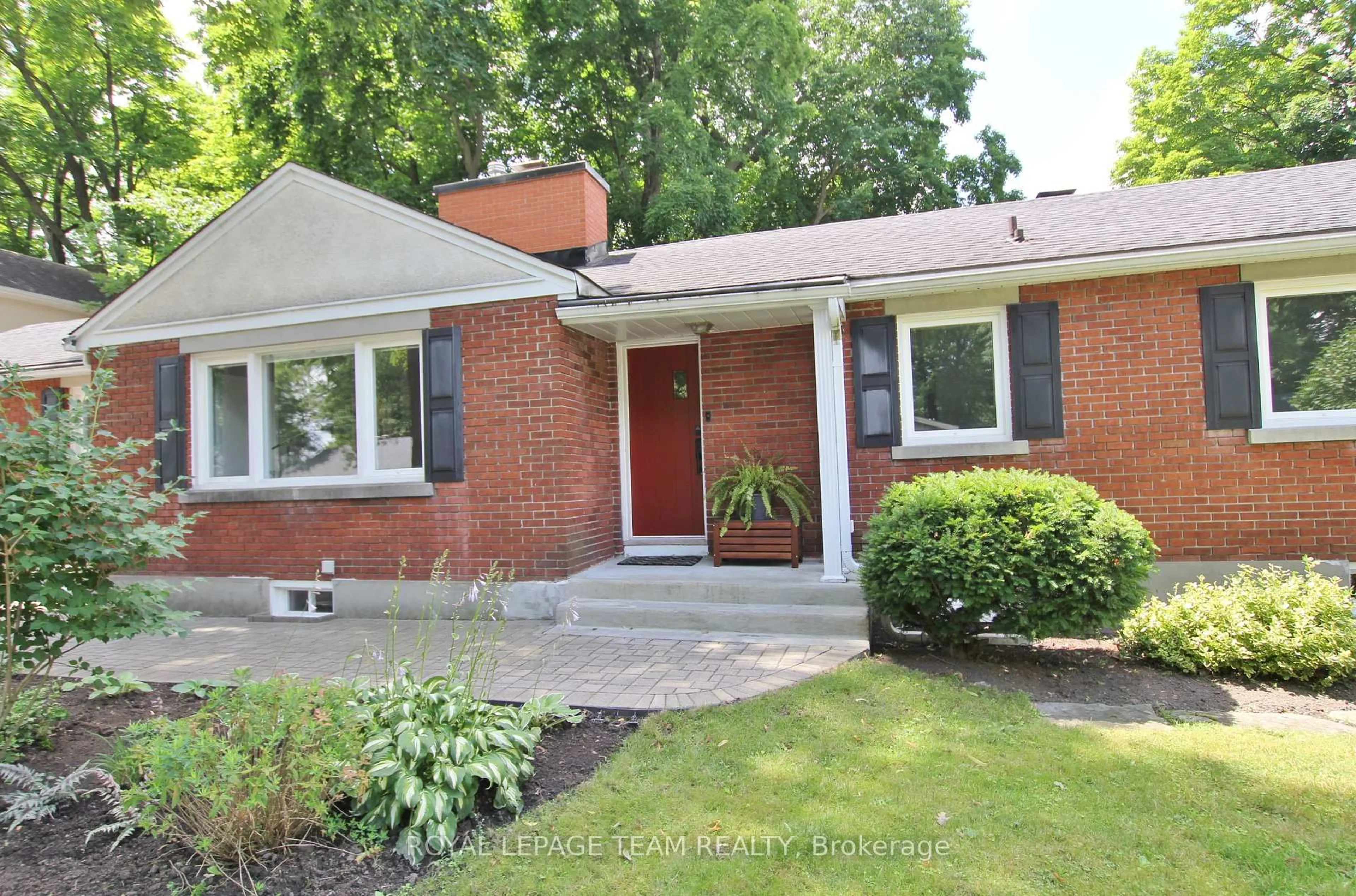 Home with brick exterior material, street for 2176 Woodcrest Rd, Ottawa Ontario K1H 6H8