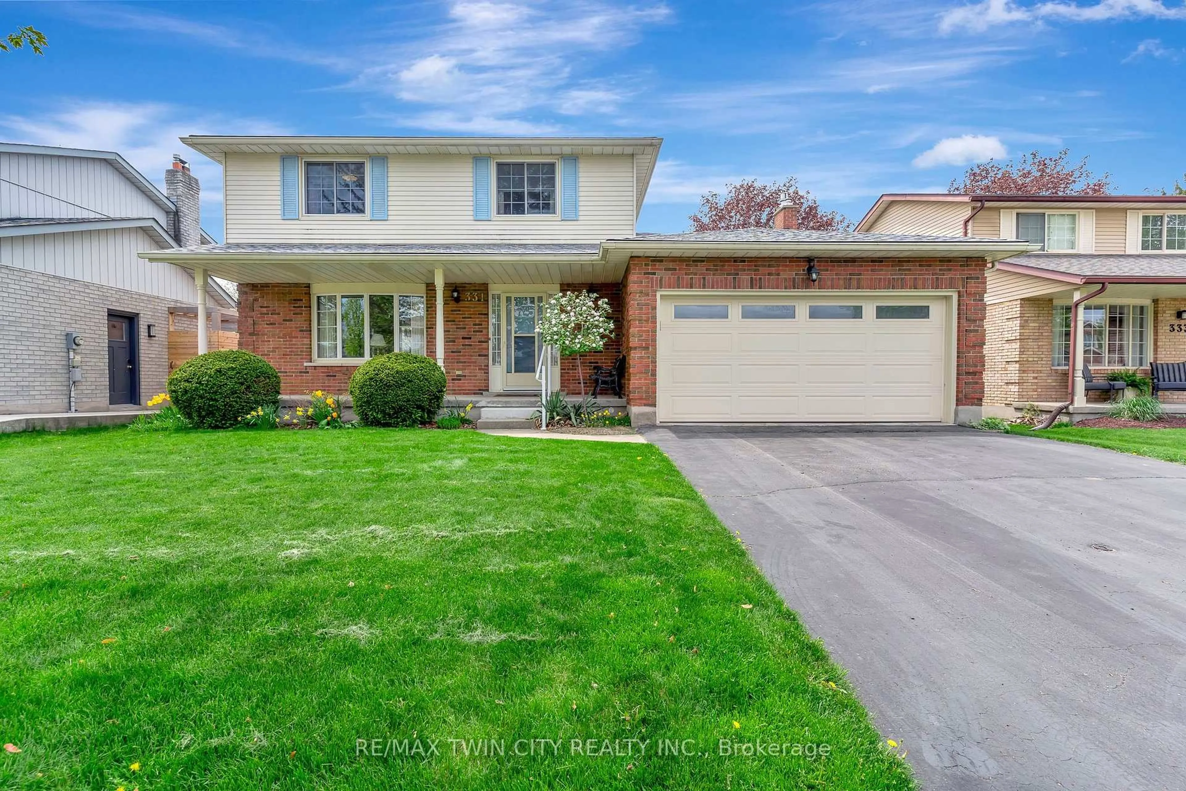 Home with brick exterior material, street for 331 Auburn Dr, Waterloo Ontario N2K 3E2