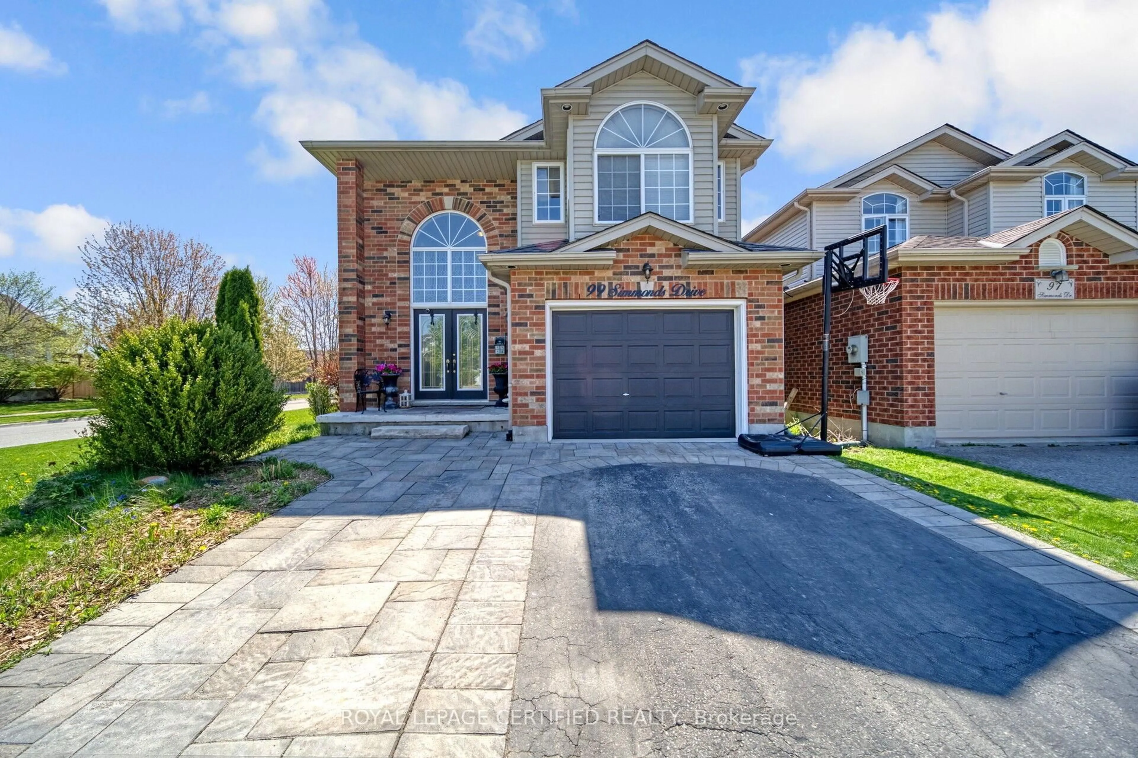 Home with brick exterior material, street for 99 Simmonds Dr, Guelph Ontario N1E 7L8